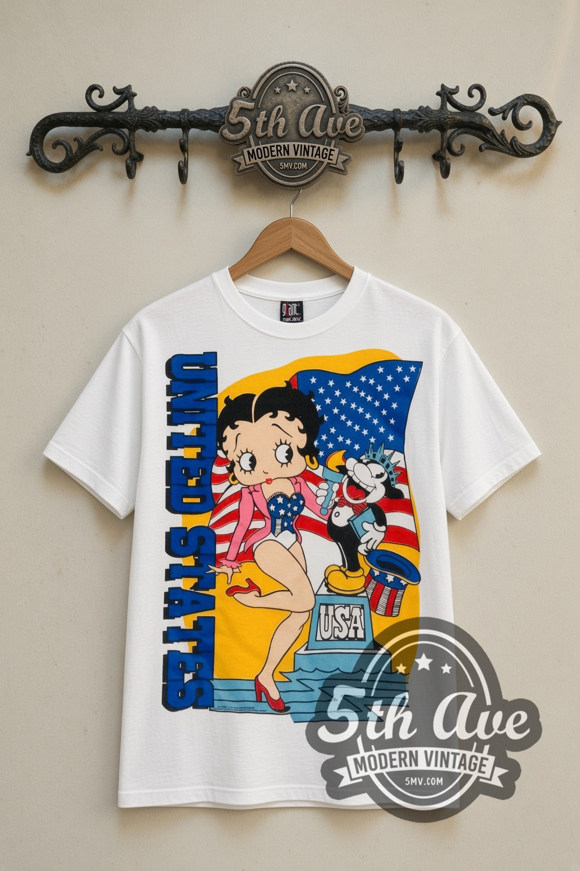 Betty Boop USA Statue of Liberty cartoon tee in white, front view on a display rack