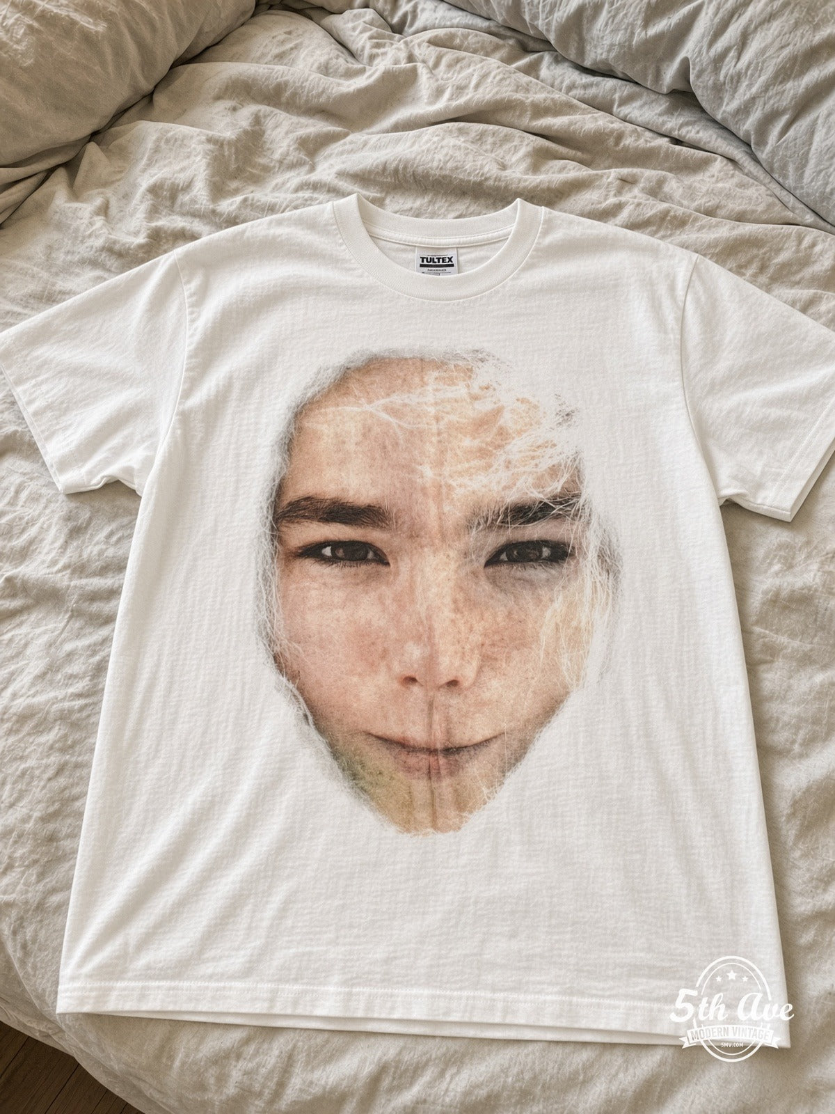 Björk Post Face / Sednaoui 1996 vintage tee laid on bed