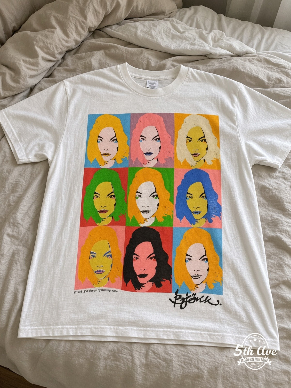 Björk POST Warhol Grid vintage band tee laid on bed