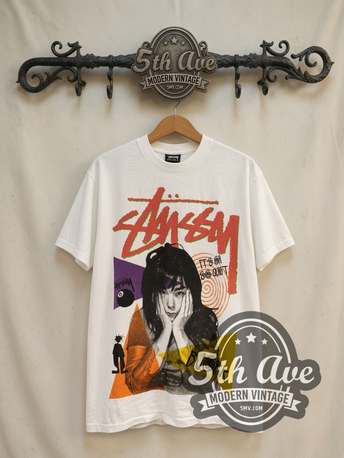 Björk × Stüssy It's Oh So Quiet vintage band t-shirt, front view on a display rack