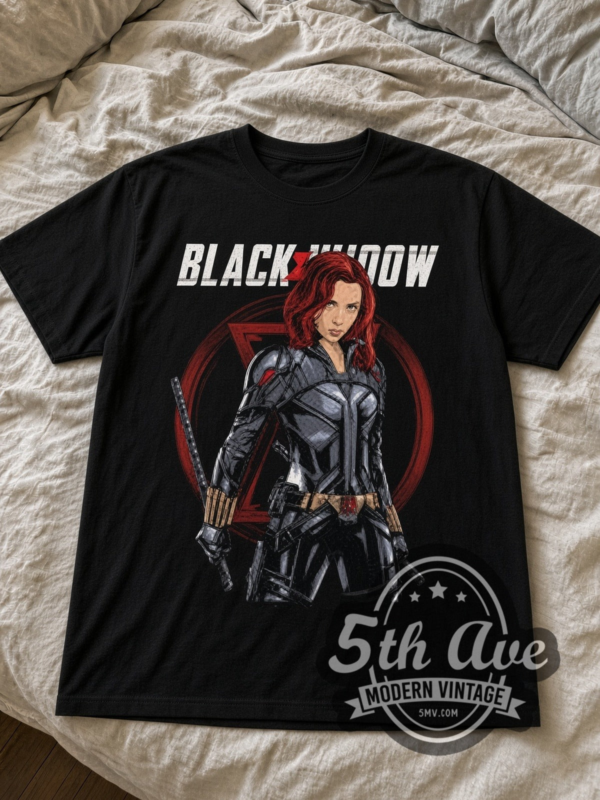 Black Widow Natasha Romanoff black graphic tee laid flat on linen bed