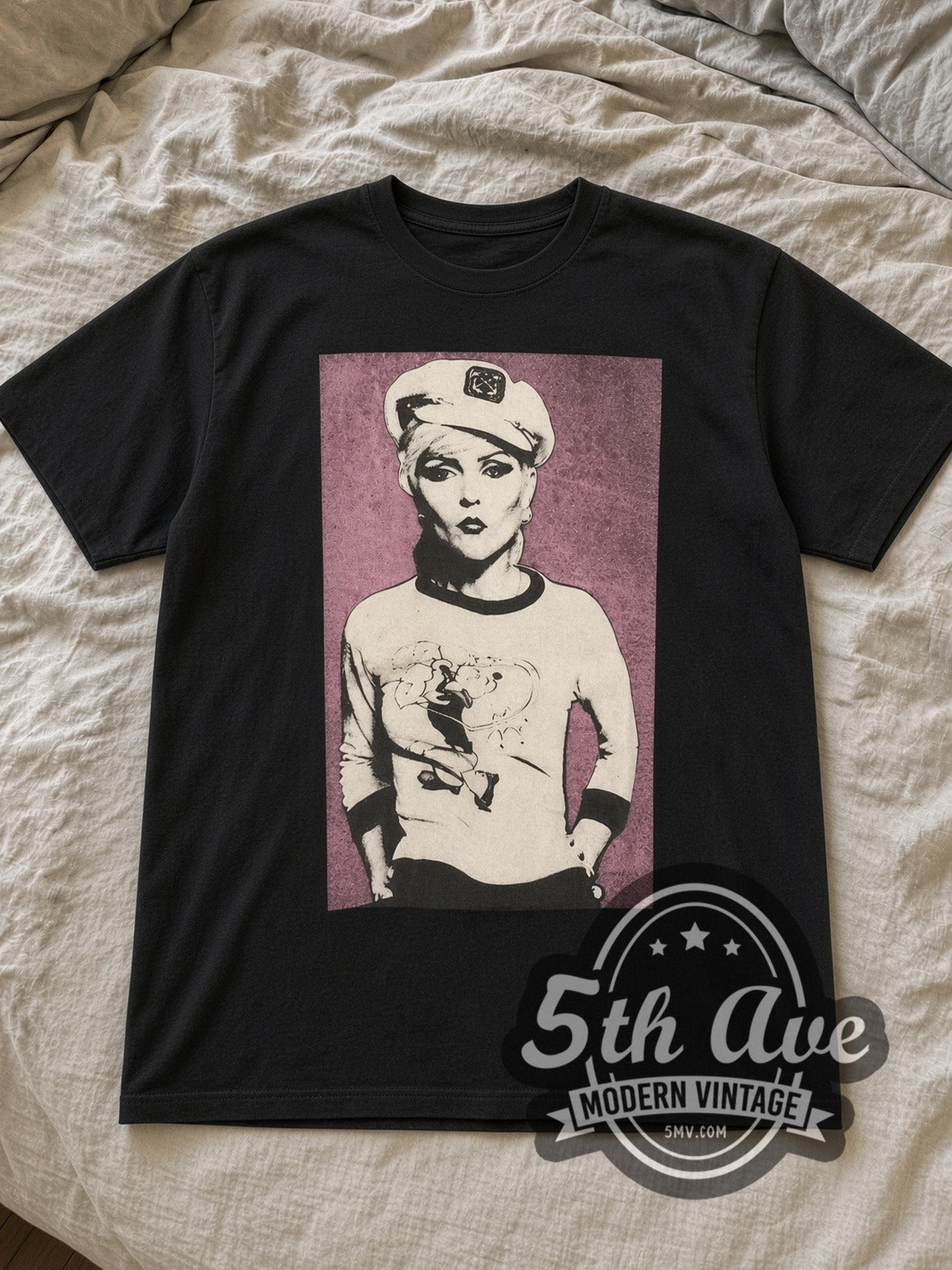 Black Blondie Icon Distressed Vintage Band T-Shirt laid flat on a linen bed