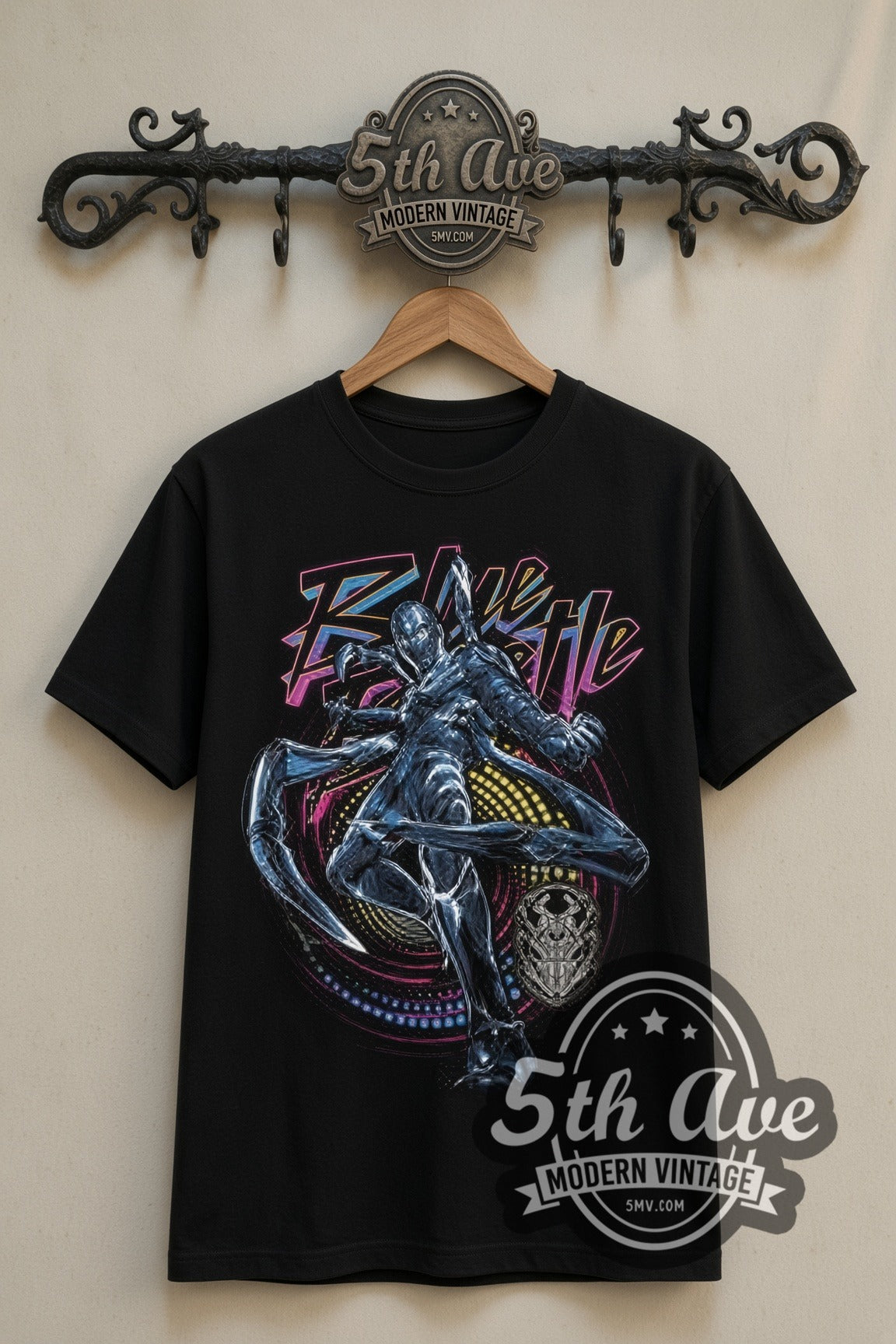 Blue Beetle double stitched black tee front on dark iron 5th Ave rack
