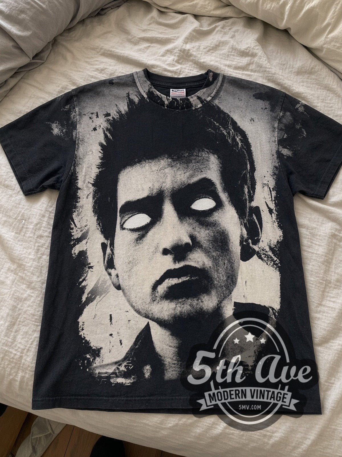 Bob Dylan Blank-Eye Distressed Portrait vintage band tee laid flat