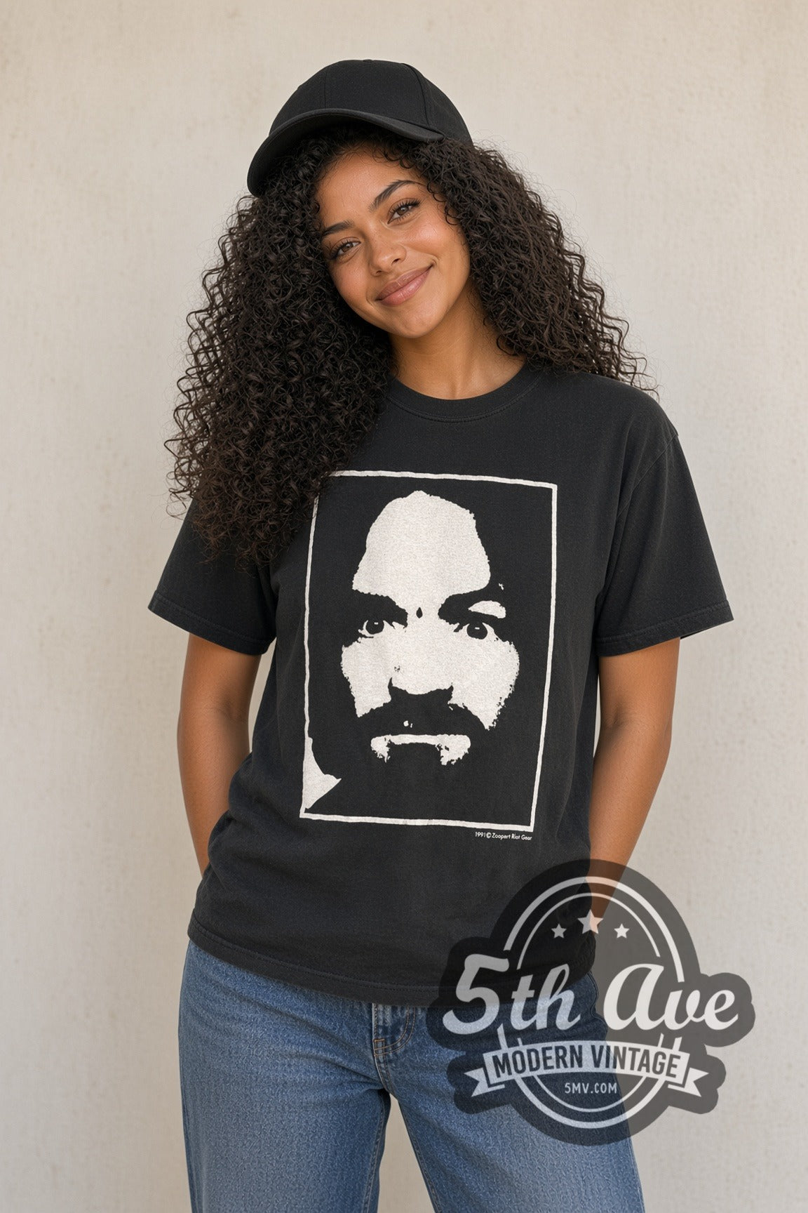 Man wearing black Charlie Dont Surf vintage graphic t-shirt