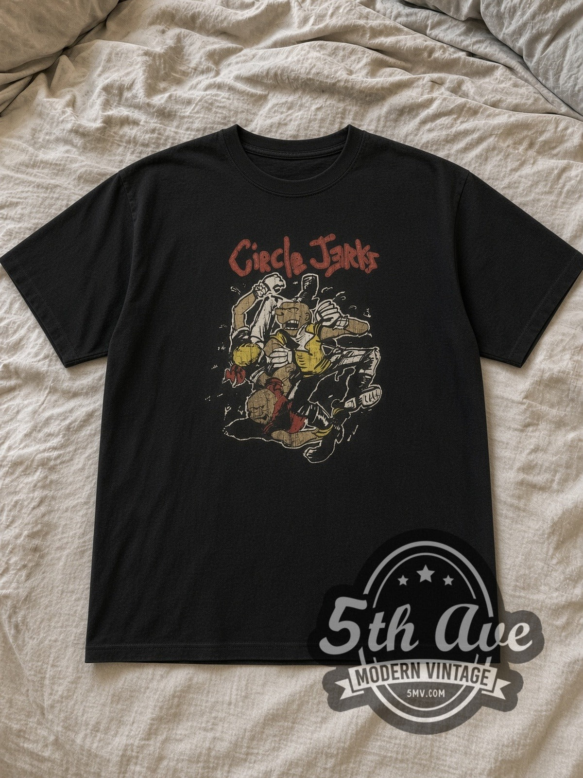 Black Circle Jerks Punk Graphic Vintage Band T-Shirt laid flat on a linen bed