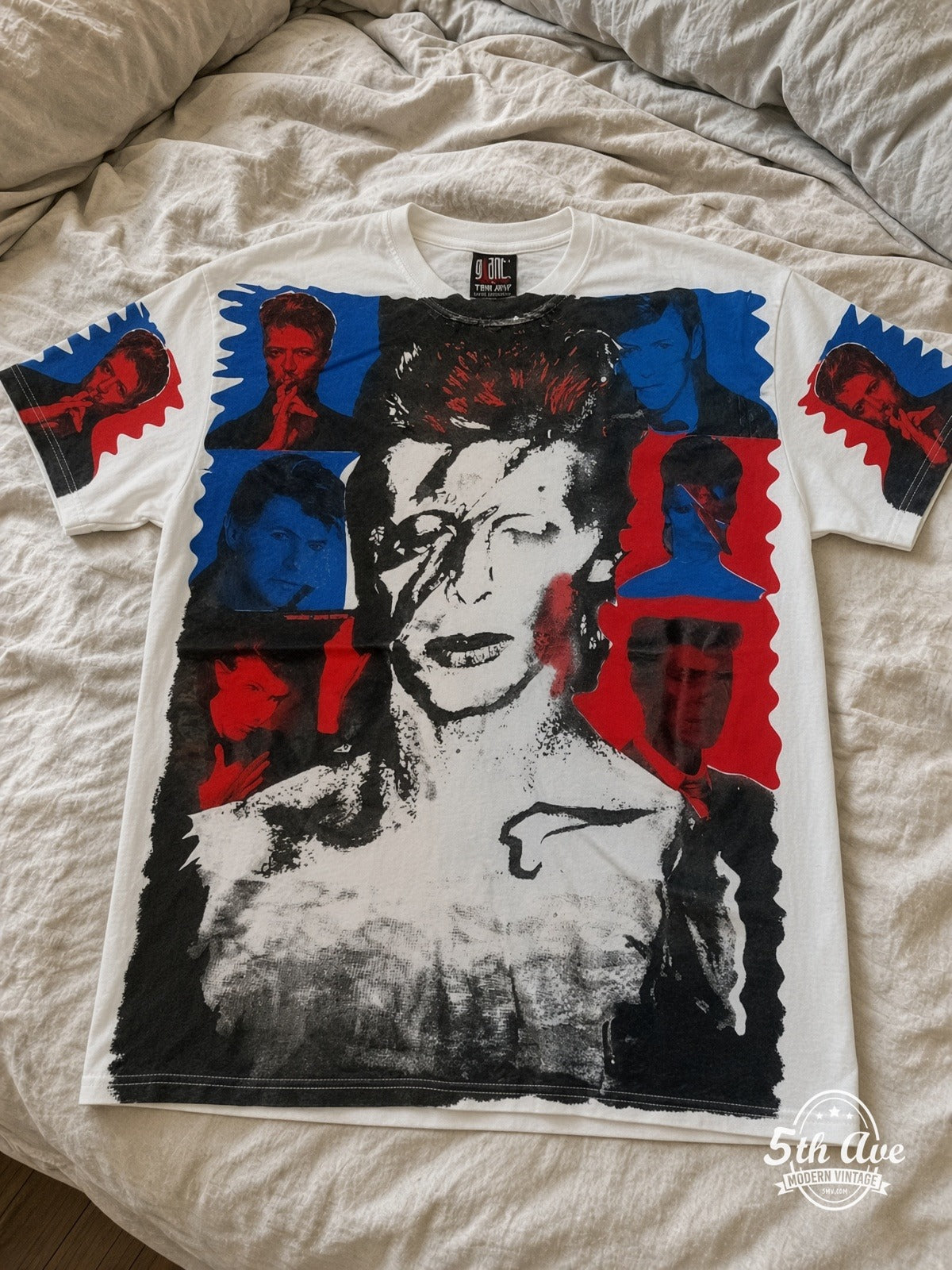 David Bowie Aladdin Sane all over print vintage tee laid on bed