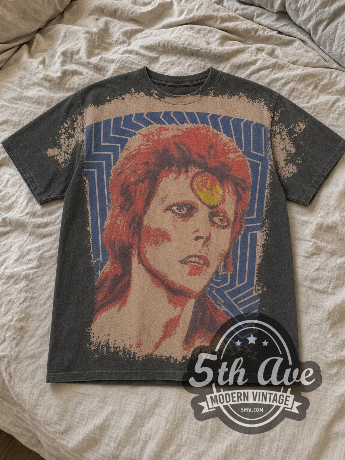 Charcoal David Bowie Mosquitohead Vintage Band T-Shirt laid flat on a linen bed