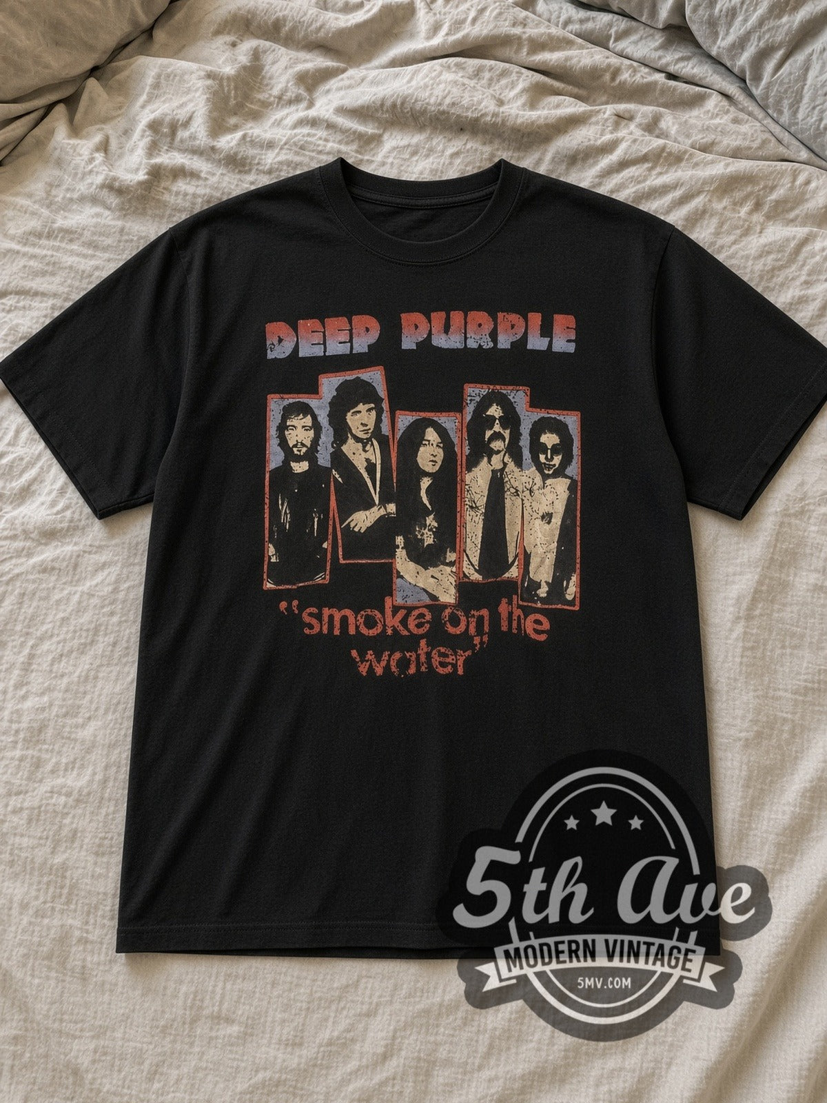 Black Deep Purple Smoke on the Water Vintage Band T-Shirt laid flat on a linen bed