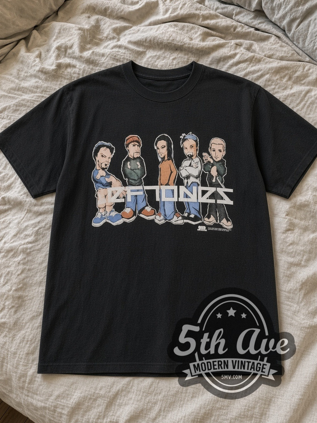 Black Deftones Tour 2001 Vintage Band T-Shirt laid flat on a linen bed