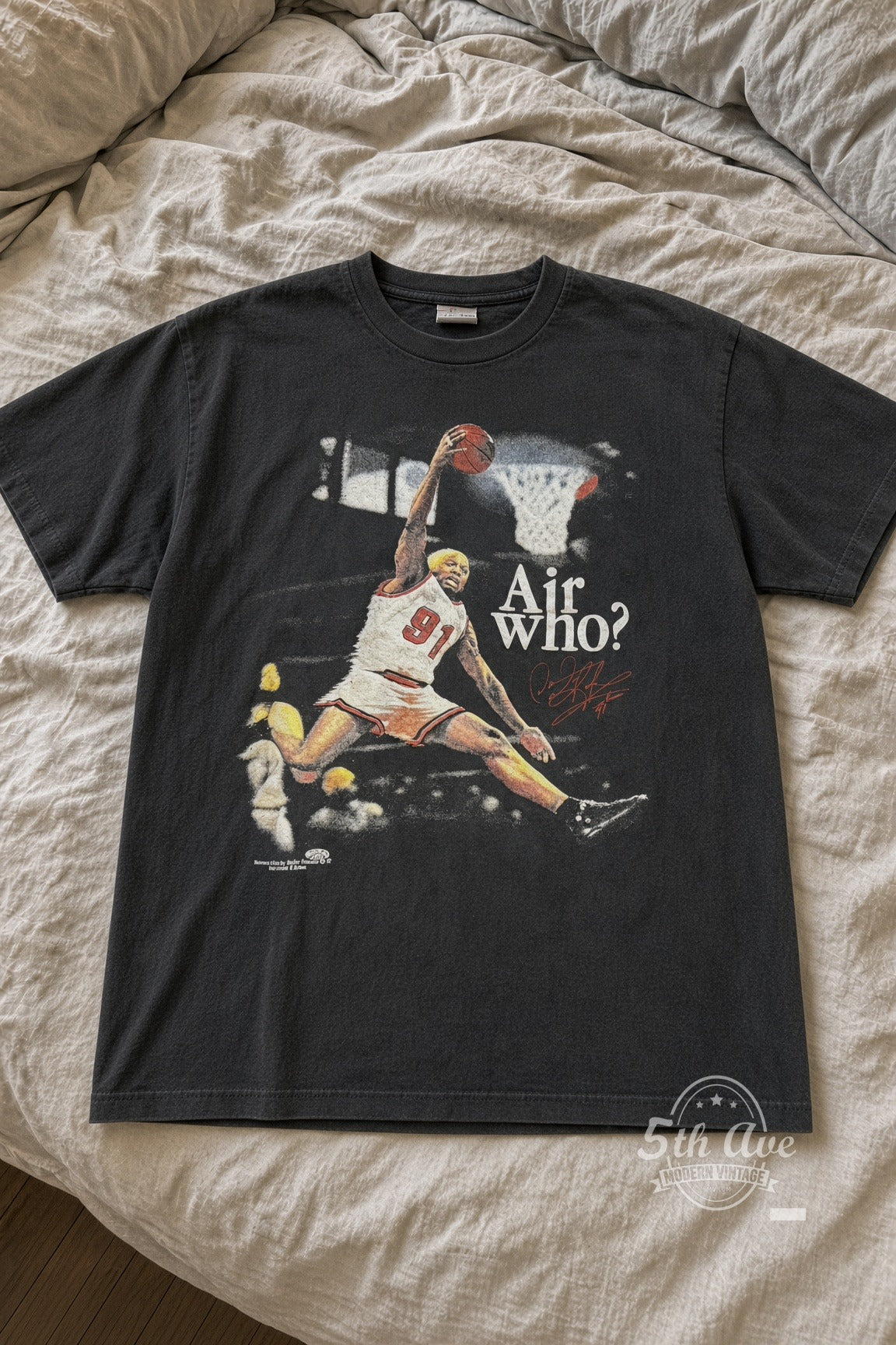 Dennis Rodman Air Who? #91 Bulls Dunk vintage tee laid flat on bed