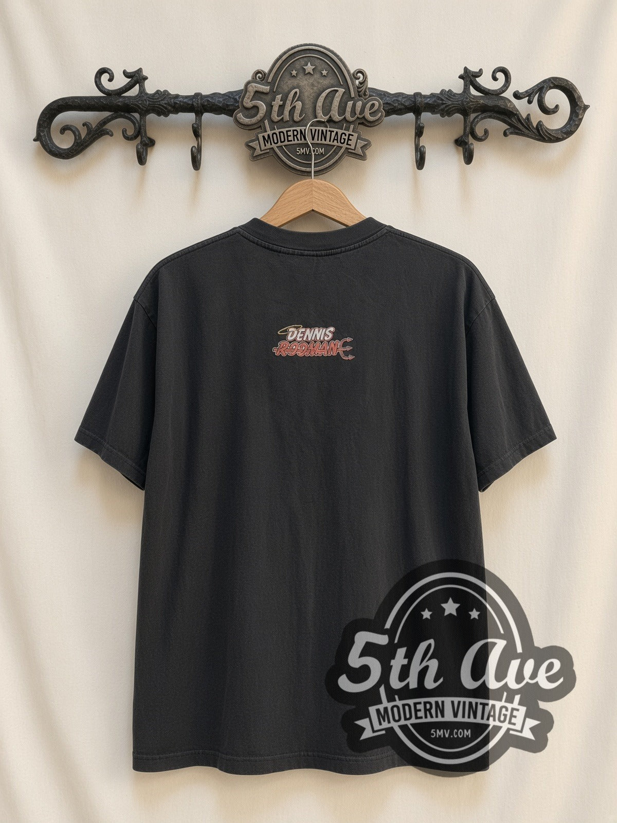 Dennis Rodman Bad As I Wanna Be vintage graphic t-shirt, back view on a display rack