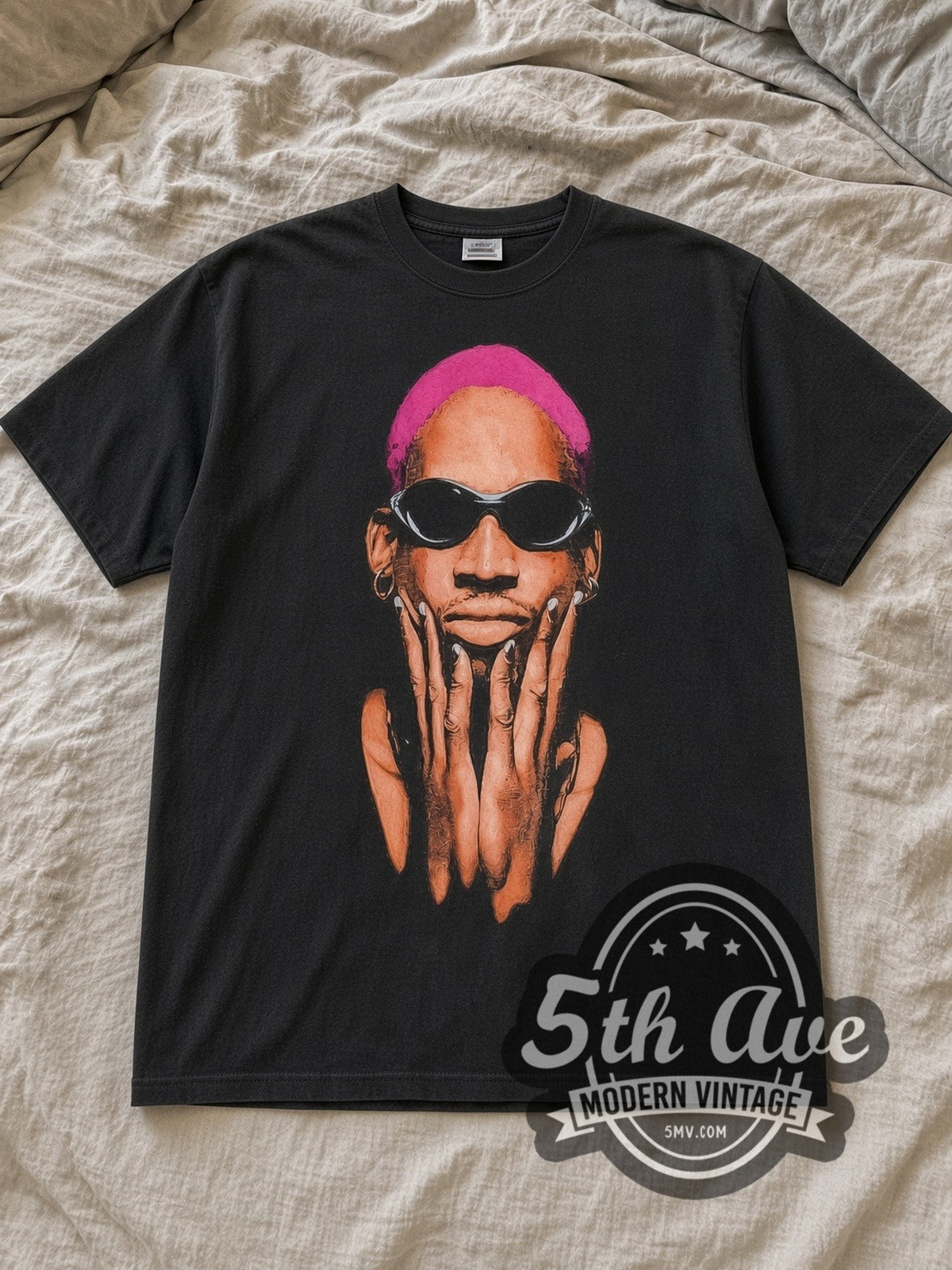 Black Dennis Rodman Not of This World Vintage Basketball T-Shirt laid flat on a linen bed