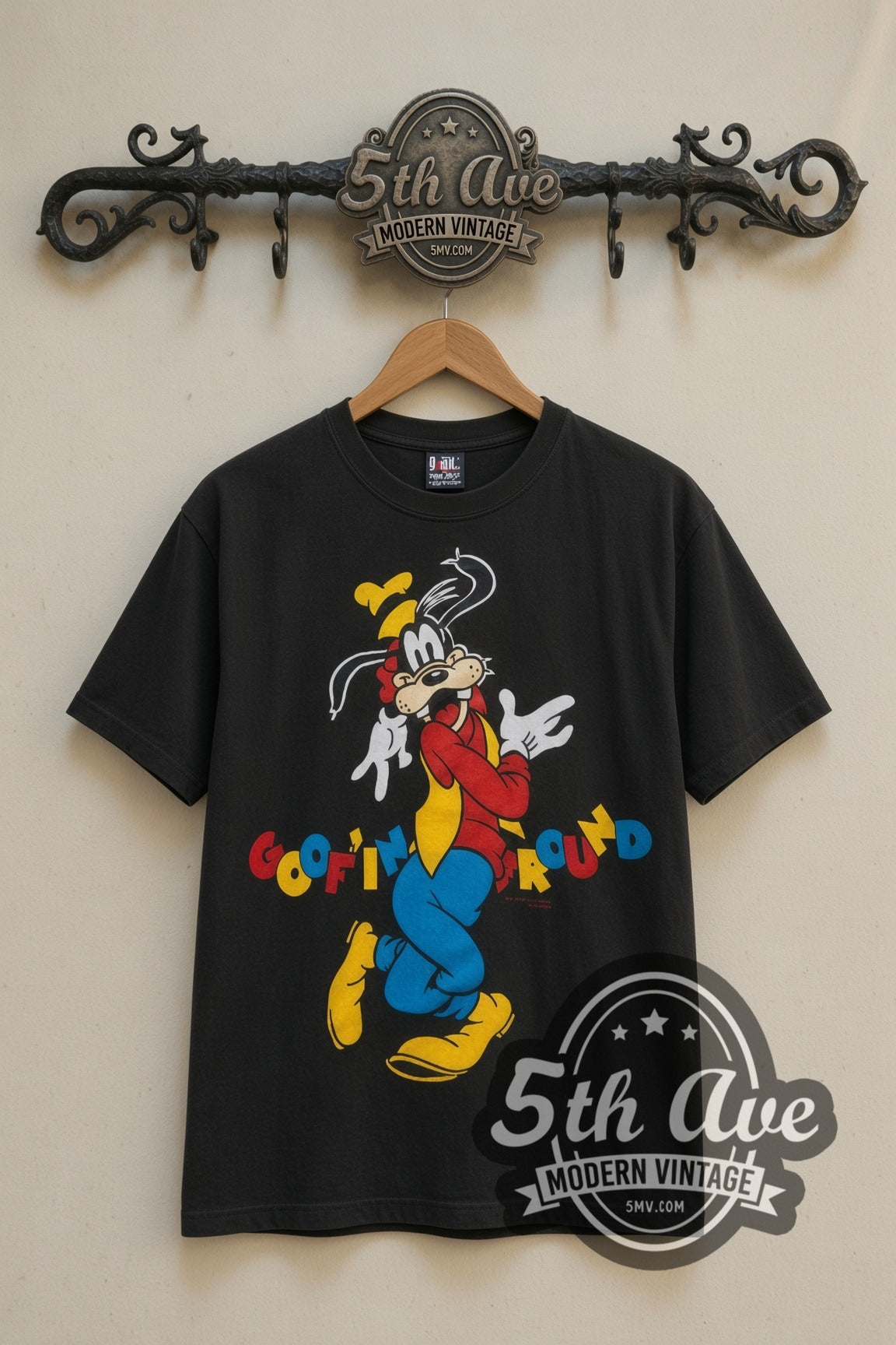 Disney Goofy Goofin Around cartoon tee in black, front view on a display rack