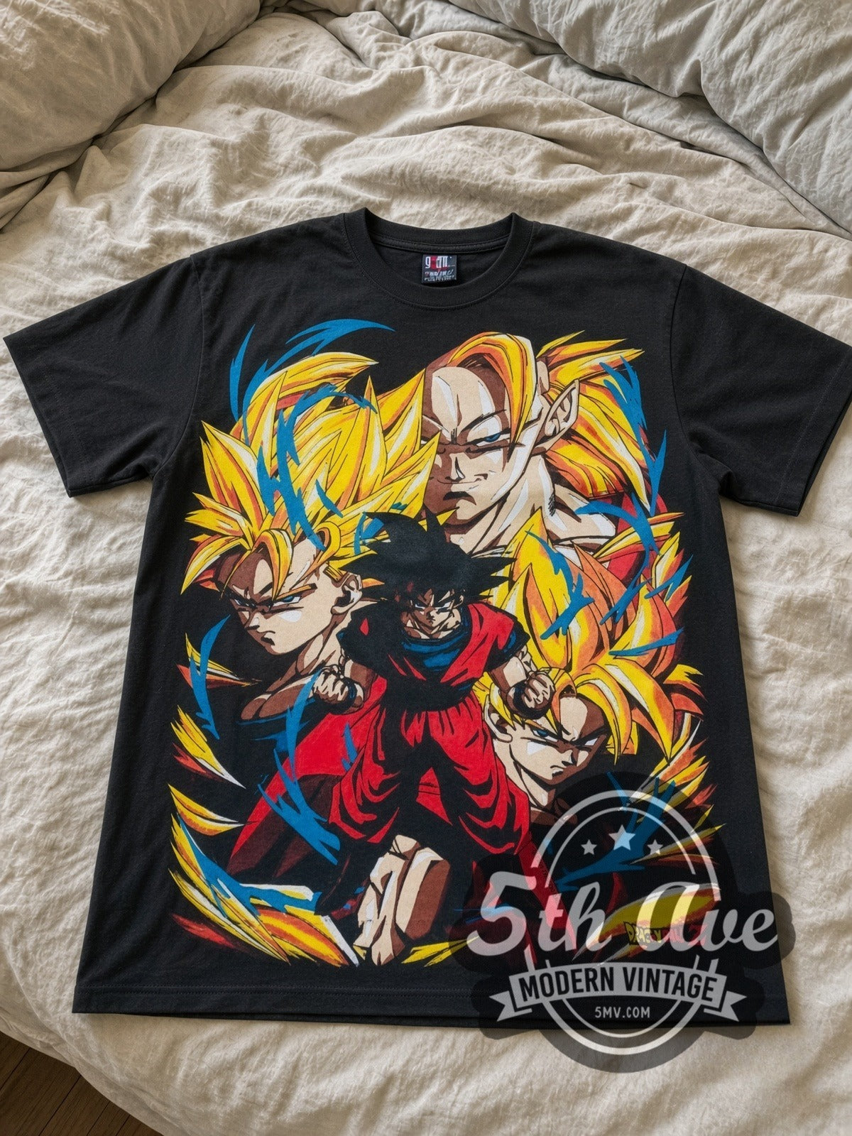 Dragon Ball Z Goku Super Saiyan Forms all-over-print vintage cartoon tee in black laid flat