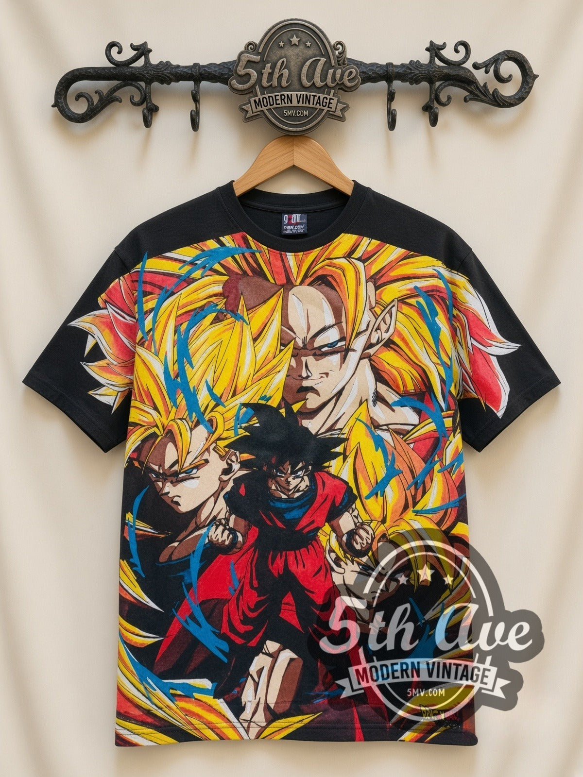 Dragon Ball Z Goku Super Saiyan Forms all-over-print vintage cartoon t-shirt in black, front view on a display rack