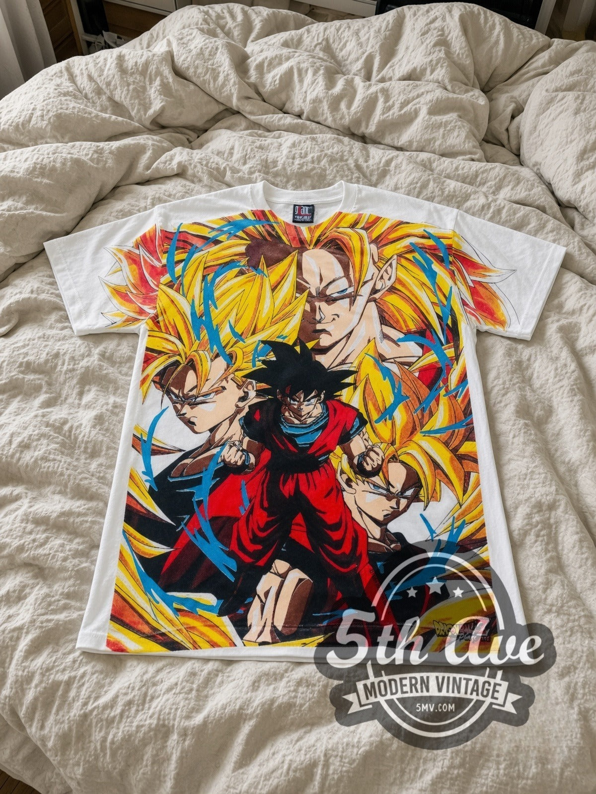 Dragon Ball Z Goku Super Saiyan Forms all-over-print vintage cartoon tee in white laid flat