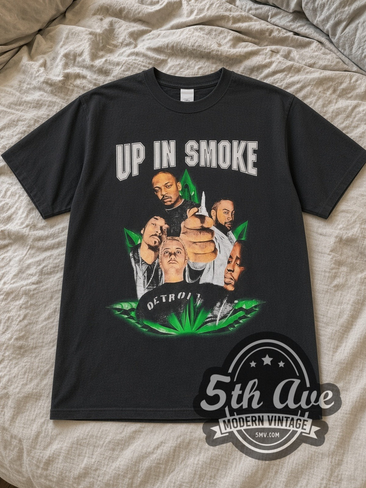 Black Dr. Dre, Snoop Dogg, Ice Cube & Eminem Up in Smoke Tour 2000 Vintage Rap Tee laid flat on a linen bed