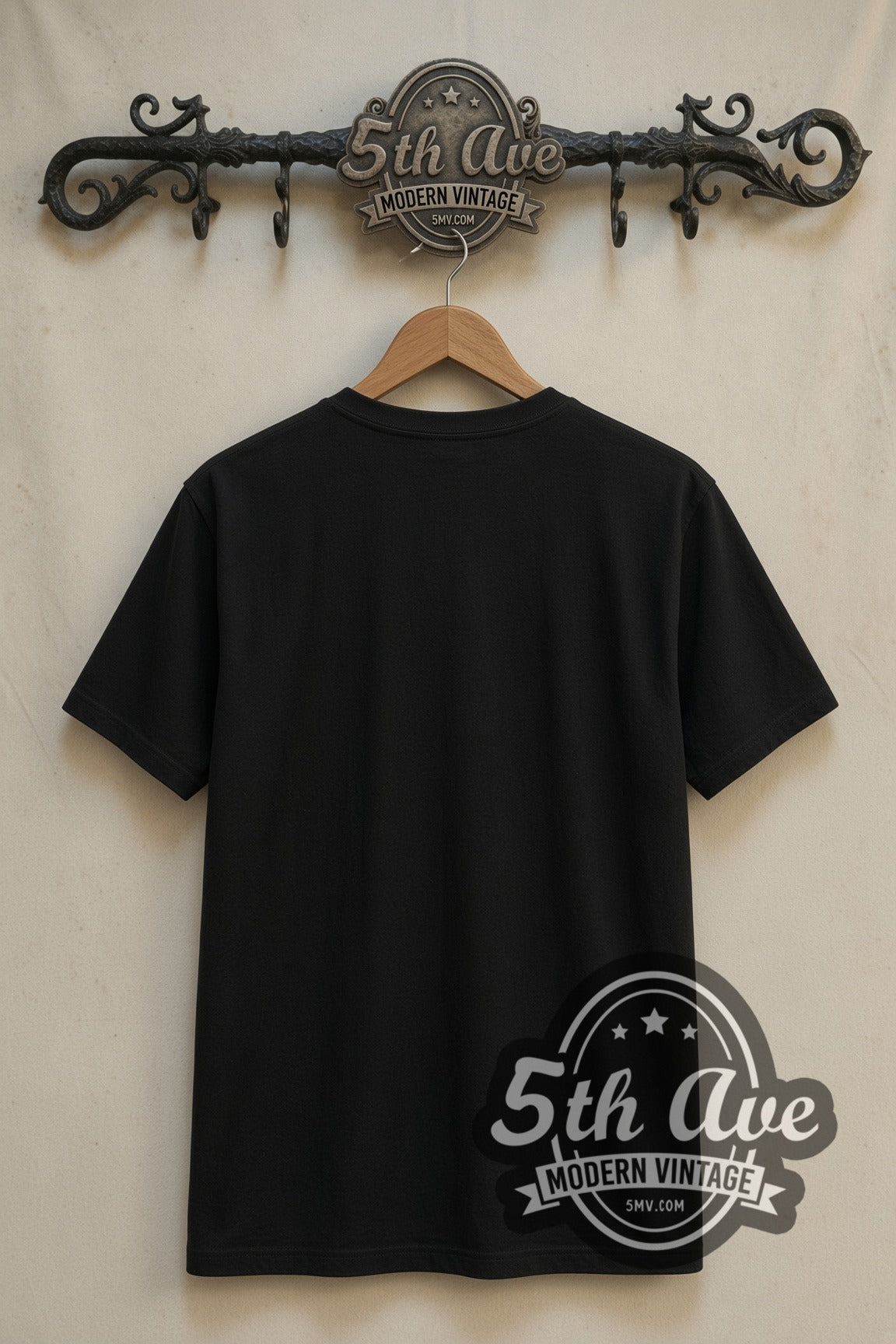 Plain black back of Elvis Presley Jailhouse Rock double stitched tee on rack