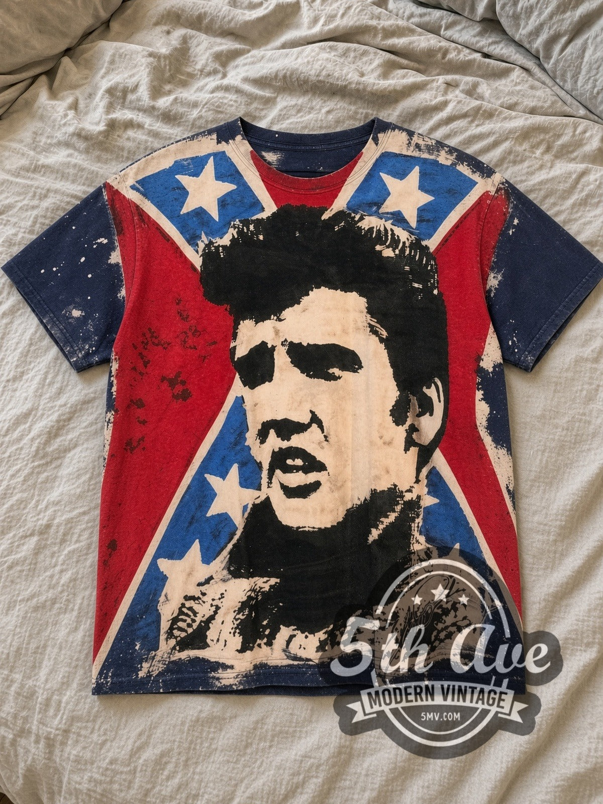 Red, White and Blue Elvis Presley King of Rock and Roll All Over Print Vintage Band T-Shirt laid flat on a linen bed