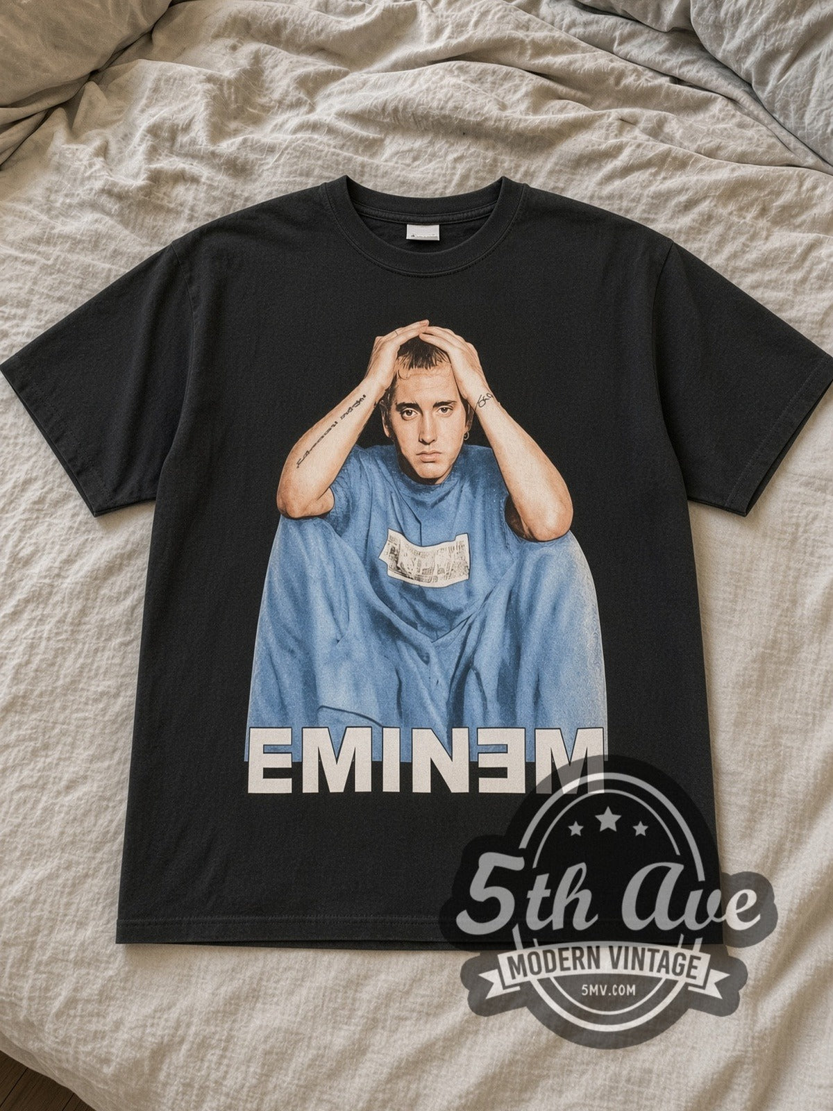 Black Eminem The Marshall Mathers LP "EMINƎM" Vintage Rap Tee laid flat on a linen bed
