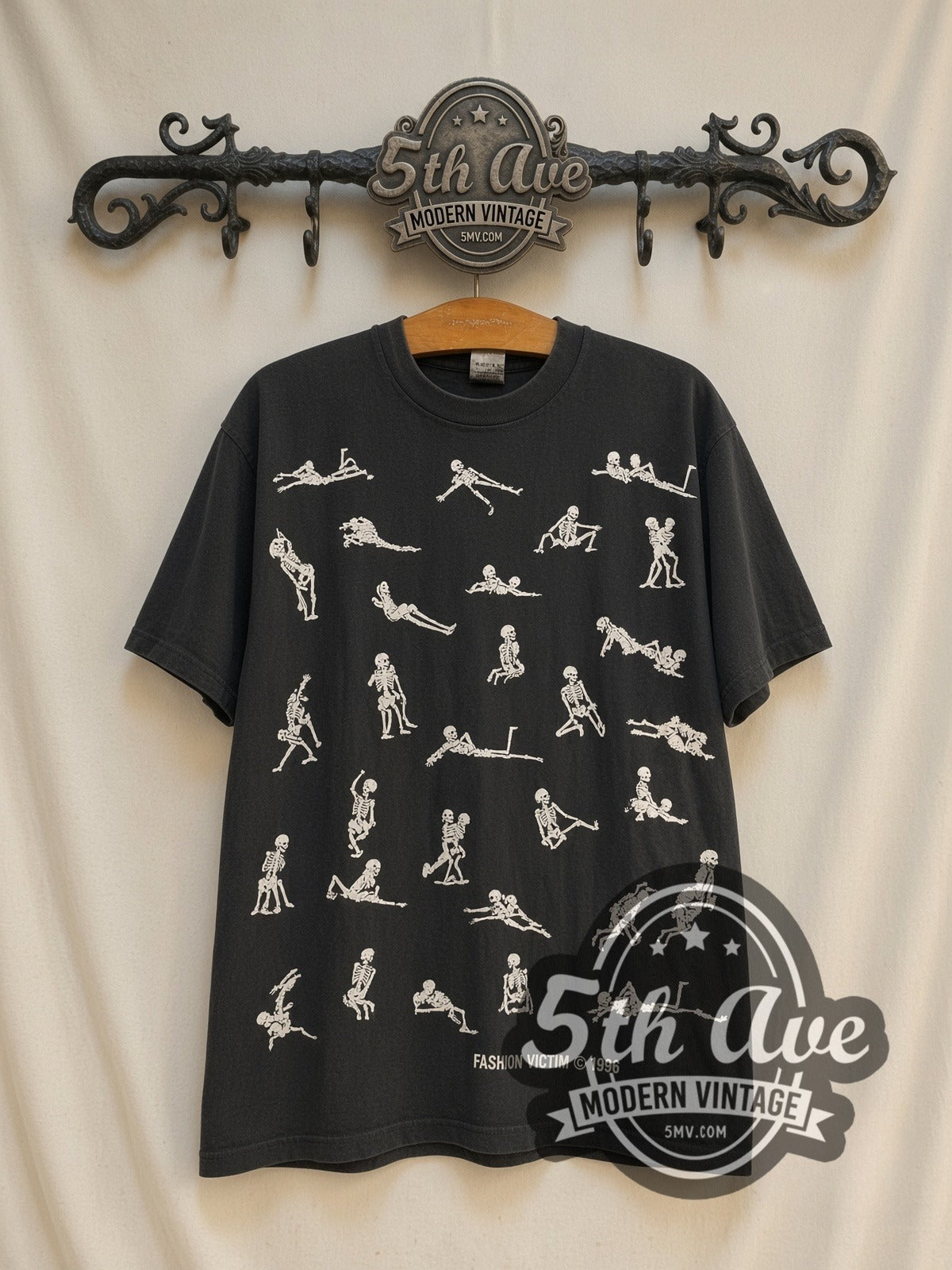Fashion Victim Skeleton Kama Sutra 1996 vintage graphic t-shirt, front view on a display rack