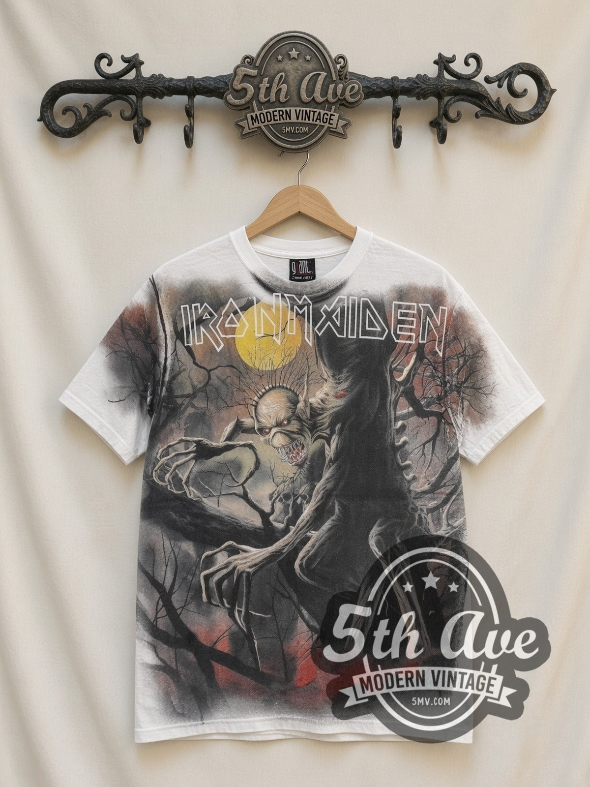Iron Maiden Fear of the Dark Eddie Tree Moon all-over-print vintage band t-shirt in white, front view on a display rack
