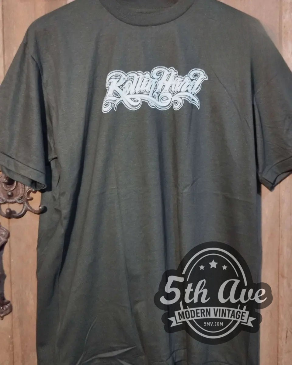 Rollin Hard – Freaky Behavior Lowrider vintage graphic t-shirt hanging on a hanger