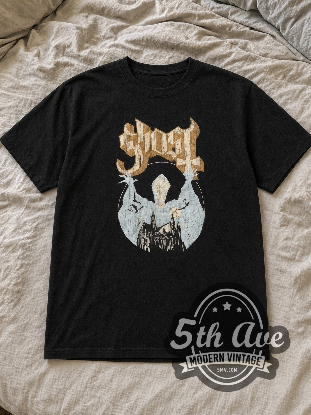 Black Ghost Logo and Papa Figure Vintage Band T-Shirt laid flat on a linen bed