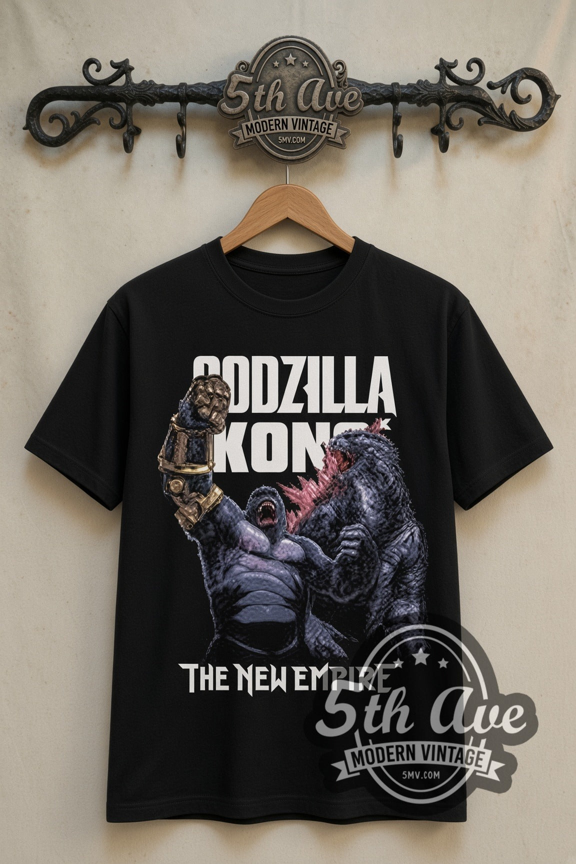 Godzilla x Kong The New Empire double stitched black tee front on dark iron 5th Ave rack