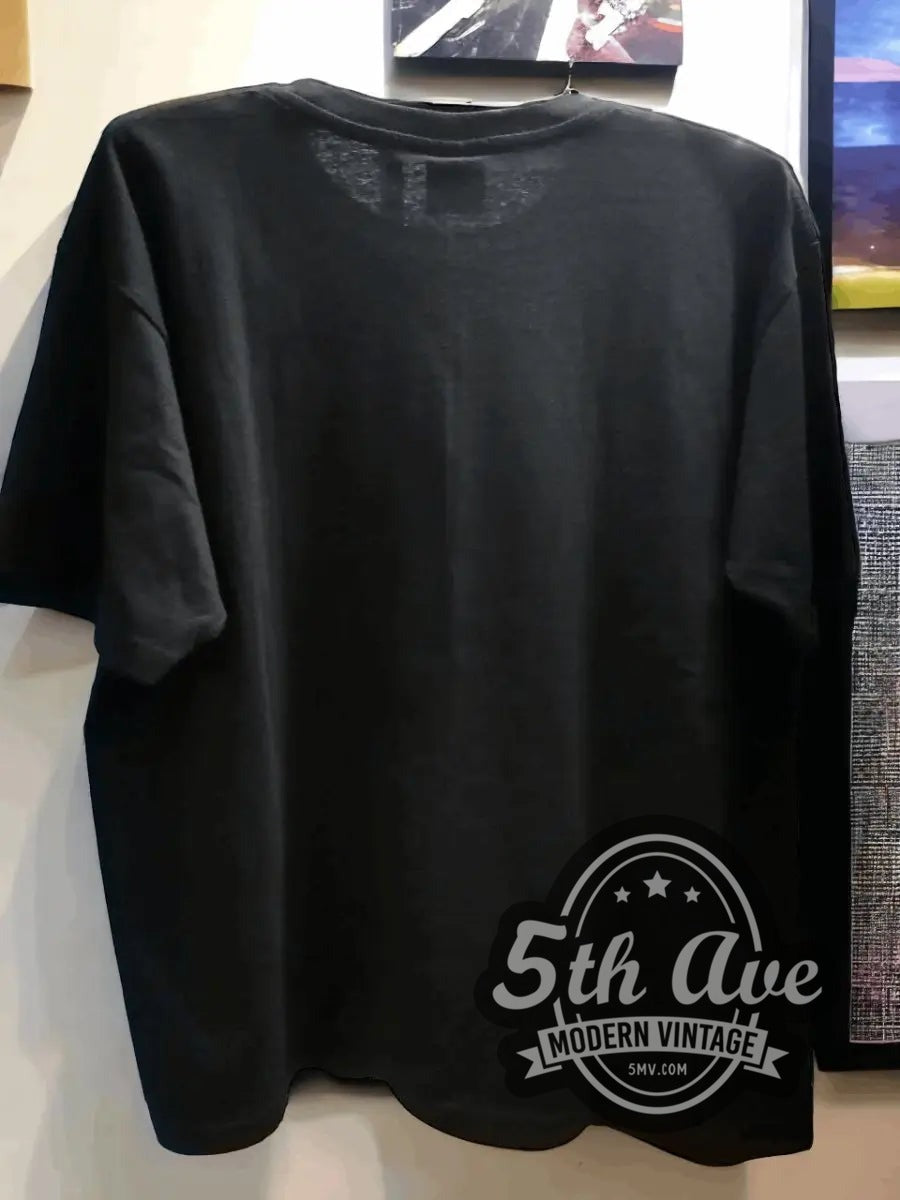 Gorillaz – Demon Days Four Panel Portraits vintage band t-shirt hanging on a hanger