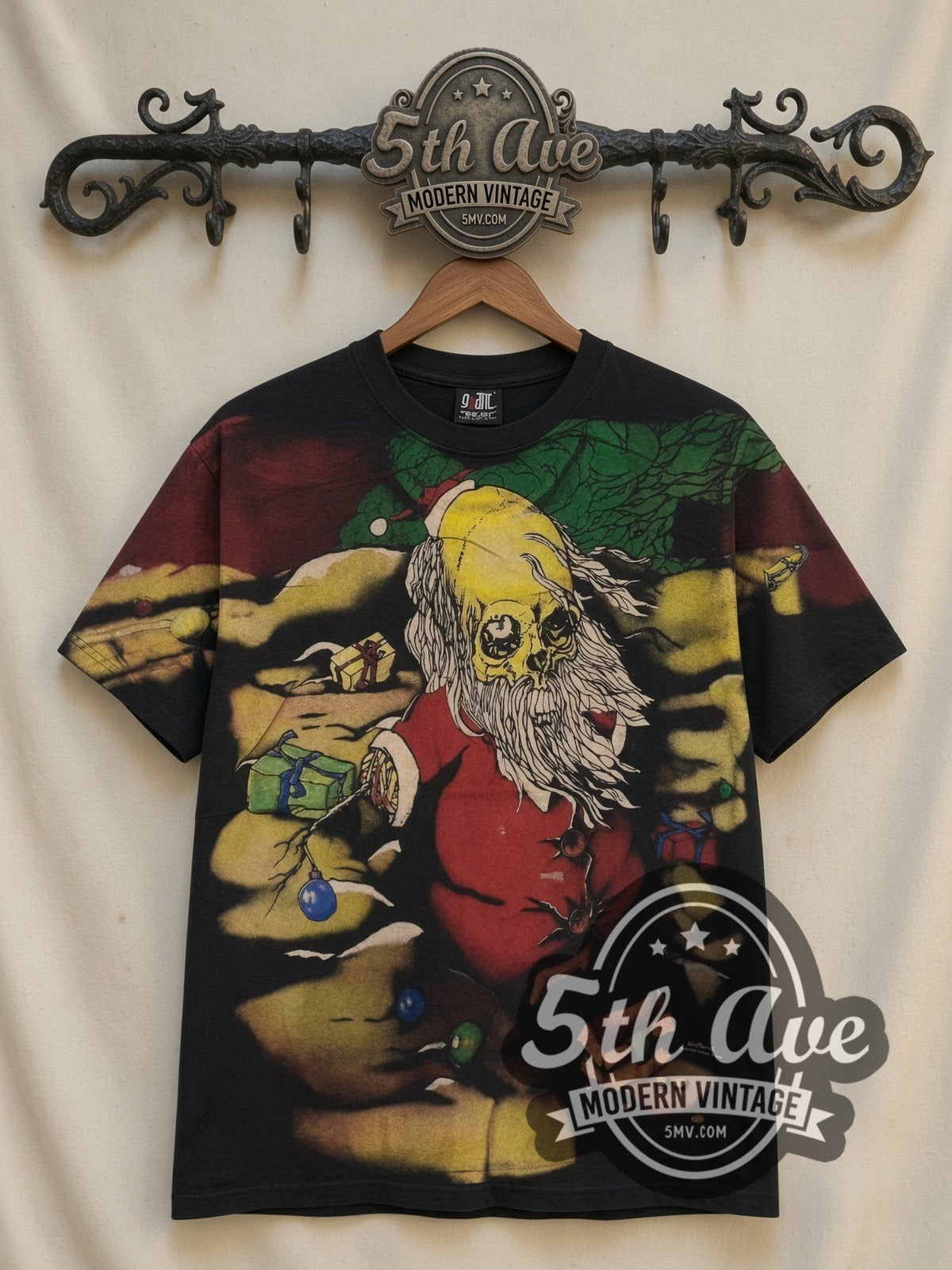 Grateful Dead Psychedelic Santa all-over-print vintage band t-shirt in black, front view on a display rack