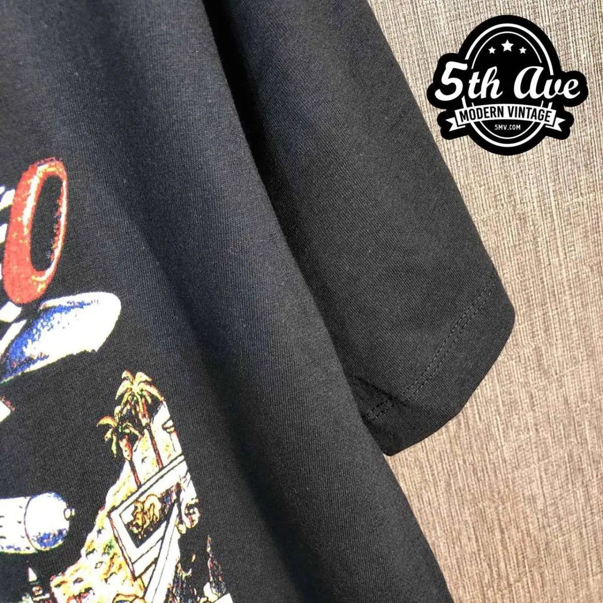 Model wearing Green Day – Dookie Album Cover Bomber vintage band tee