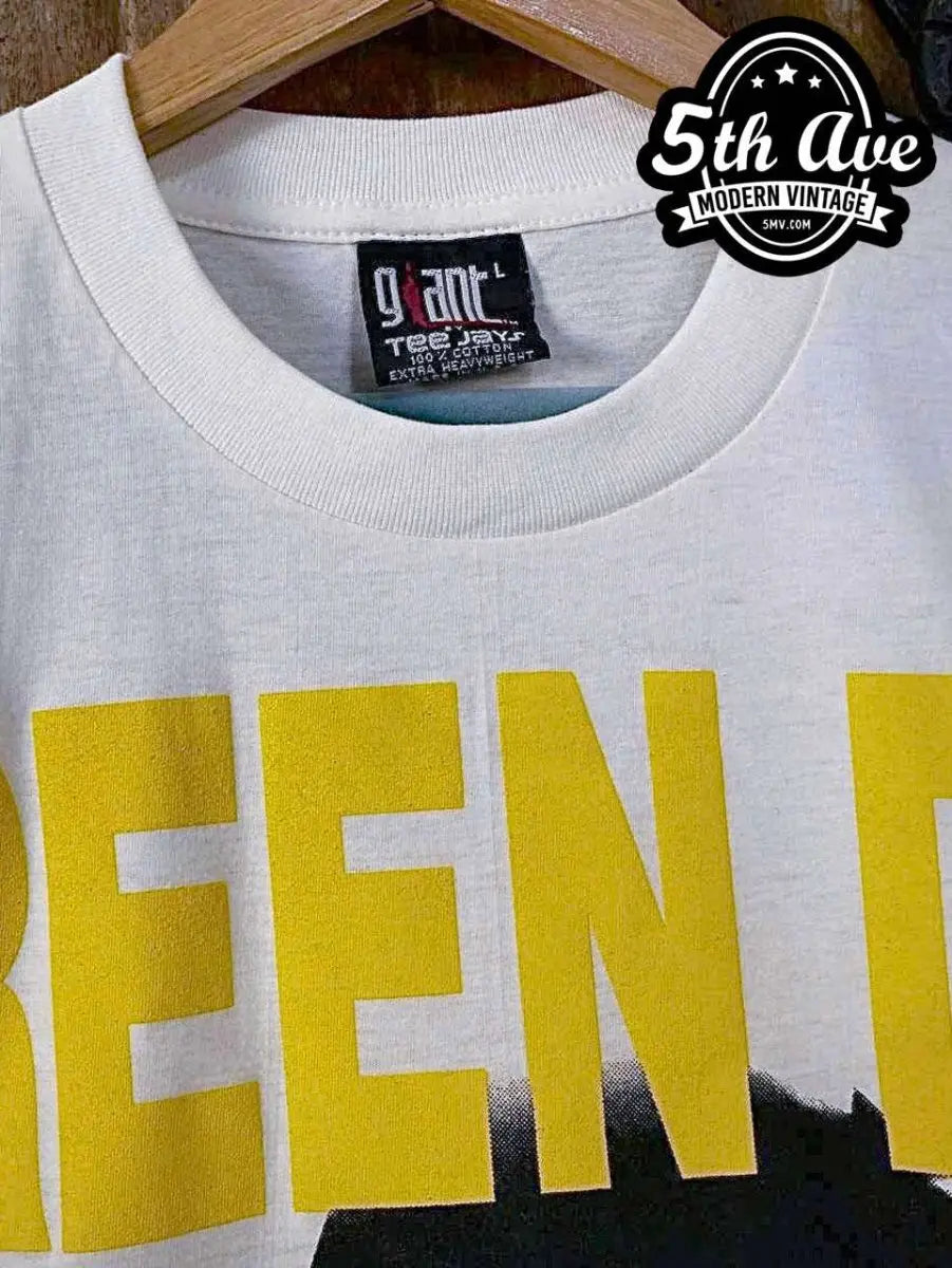 Model wearing Green Day – Nimrod Tour T-Shirt Vintage Rock Graphic vintage band tee