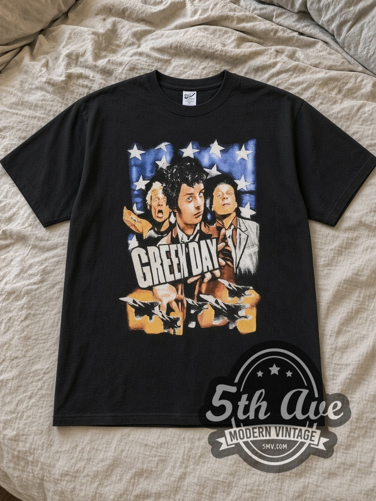 Black Green Day Warning Vintage Band T-Shirt laid flat on a linen bed