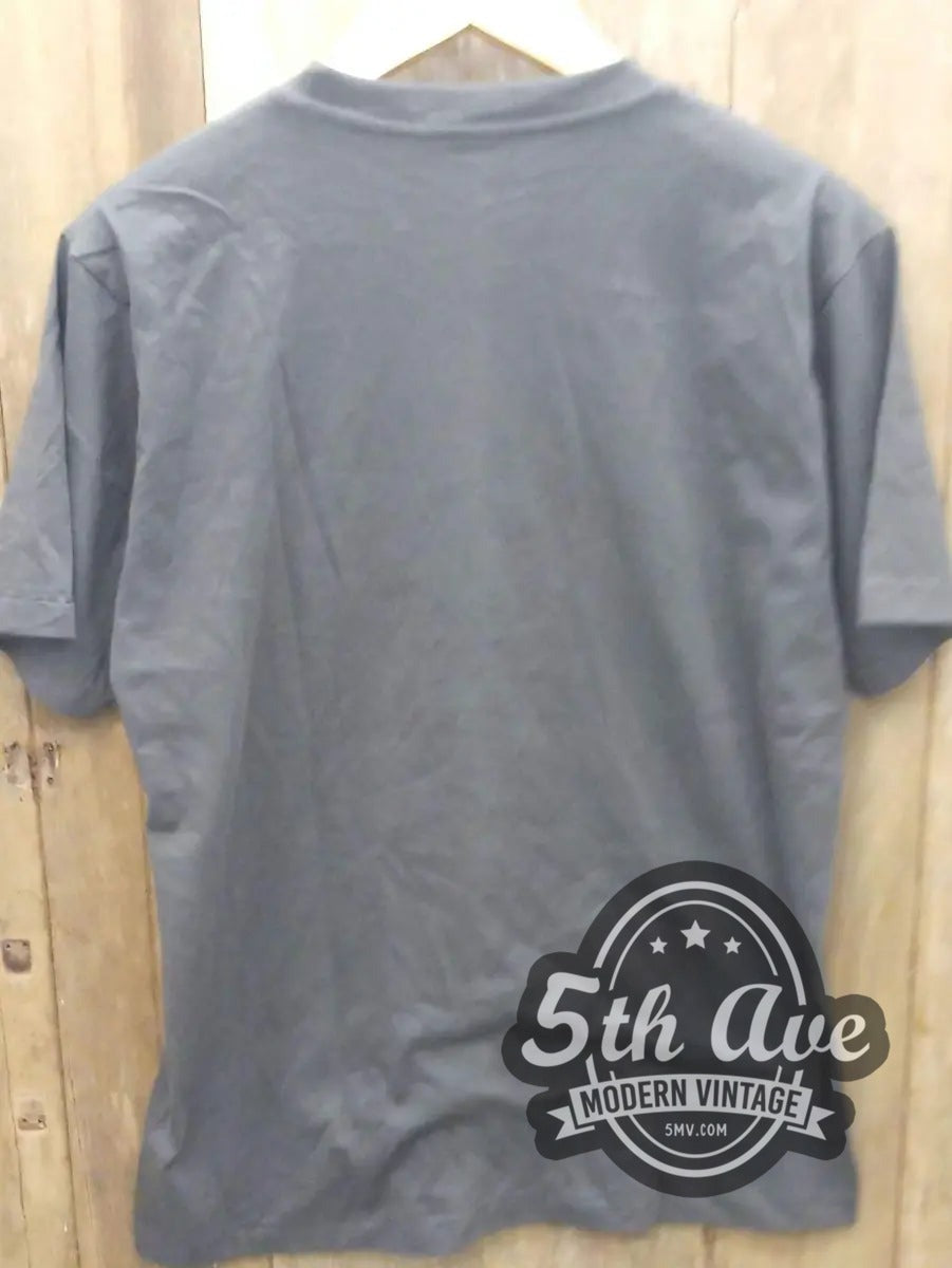 Green Day – Frontman Portrait vintage band t-shirt hanging on a hanger
