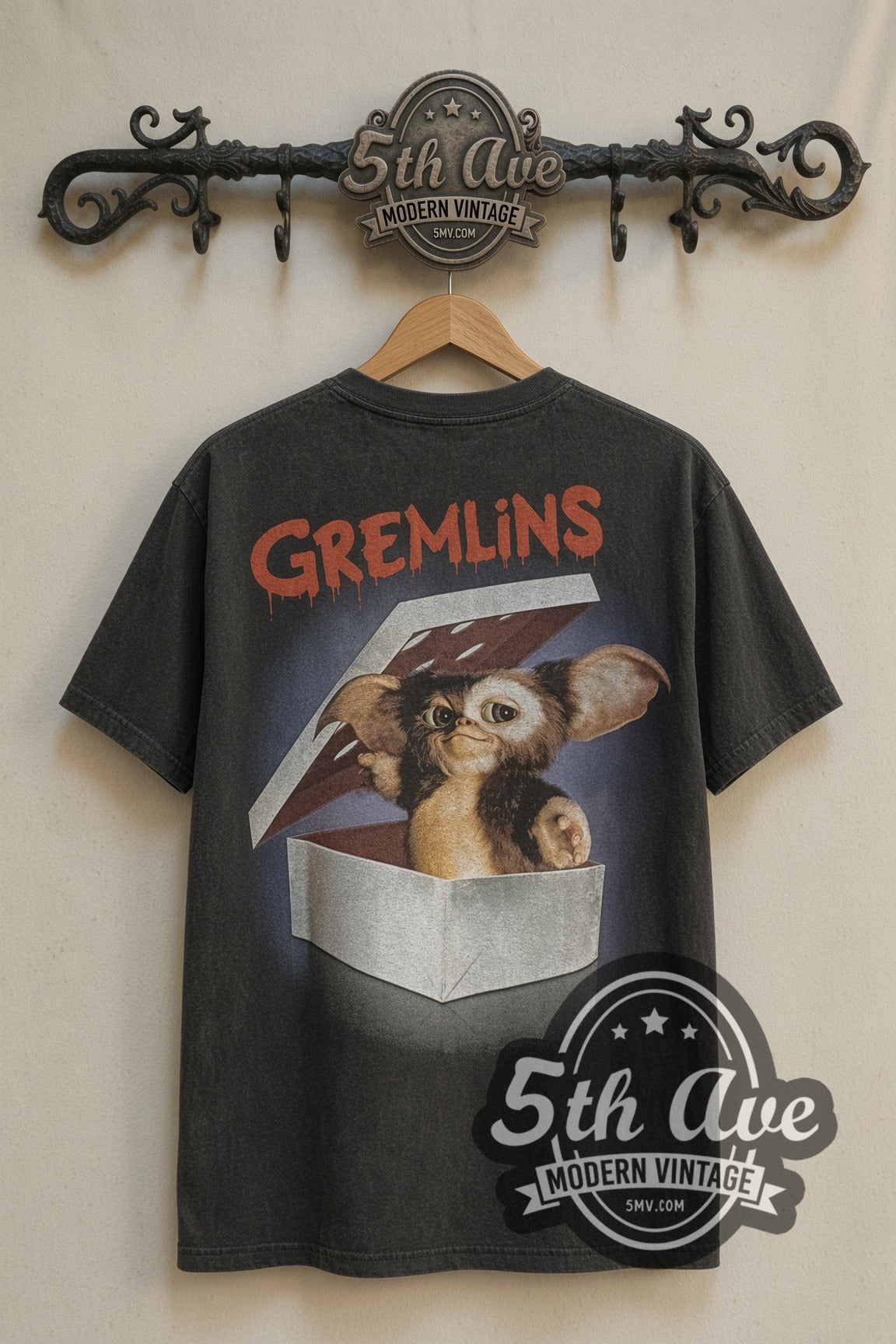 Back print of Gremlins Est. 1984 Gizmo & Stripe / Gizmo in a Box vintage movie tee on 5th Ave rack