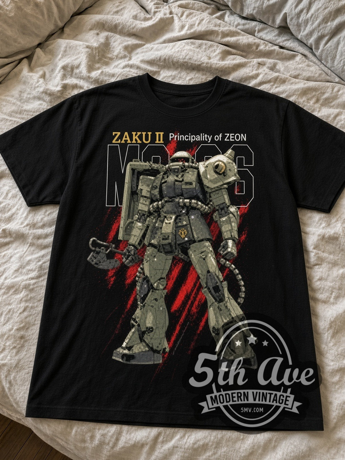 Gundam Zaku II black graphic tee laid flat on linen bed