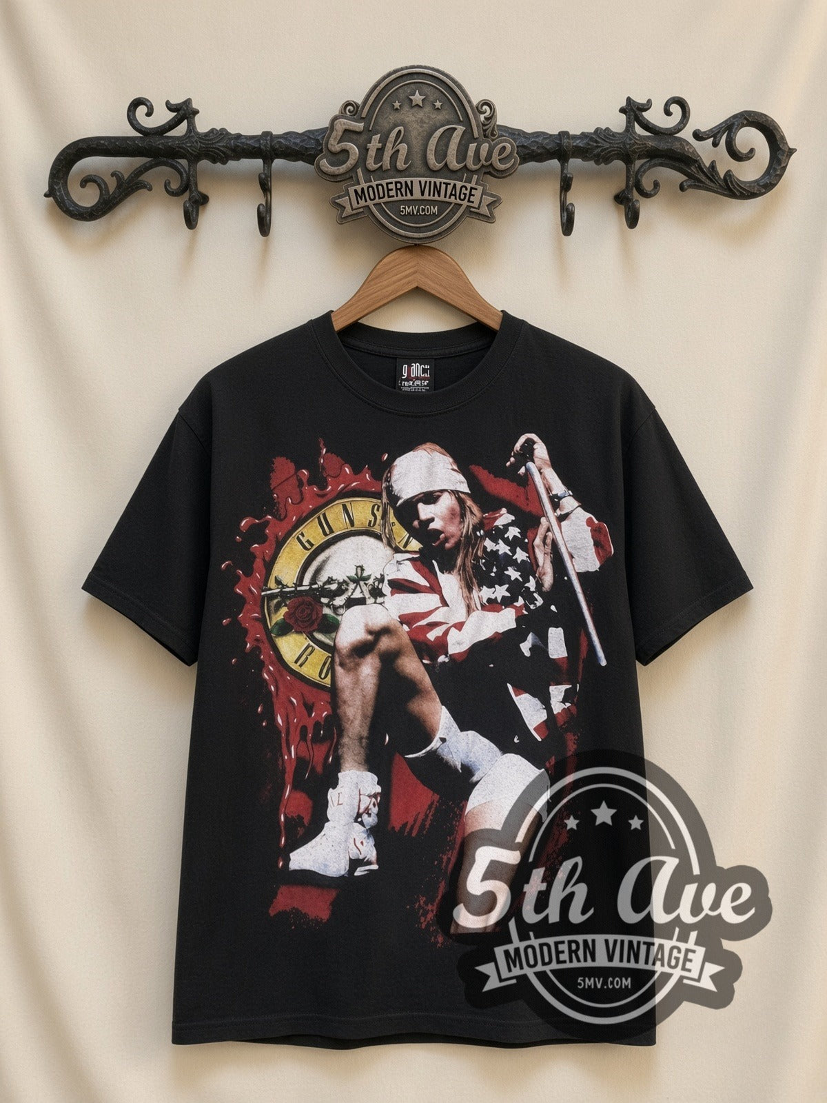 Guns N' Roses Axl Circular Logo all-over-print vintage band t-shirt in black, front view on a display rack