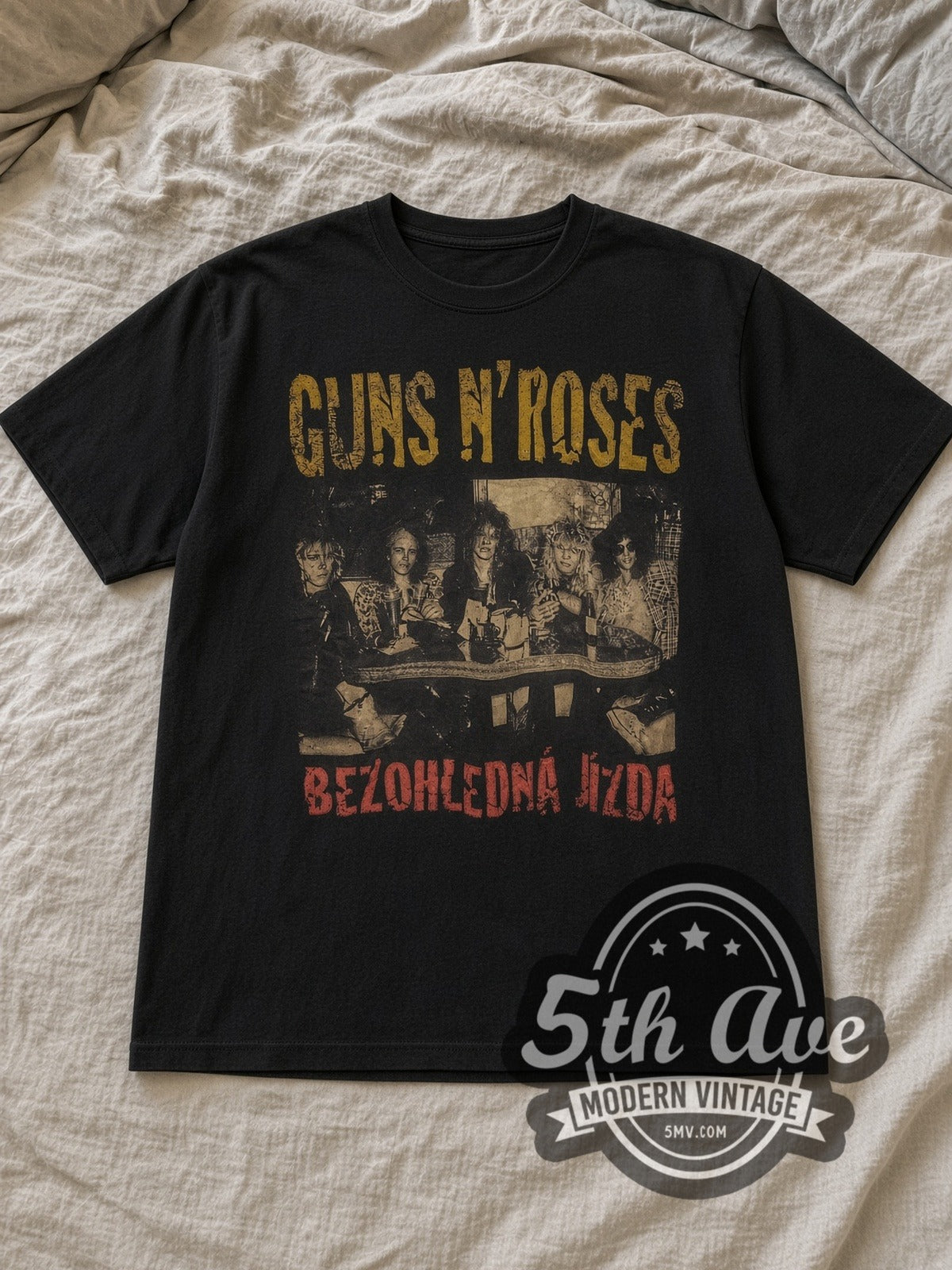 Black Guns N' Roses Bezohledná Jízda Band Photo Vintage Band T-Shirt laid flat on a linen bed