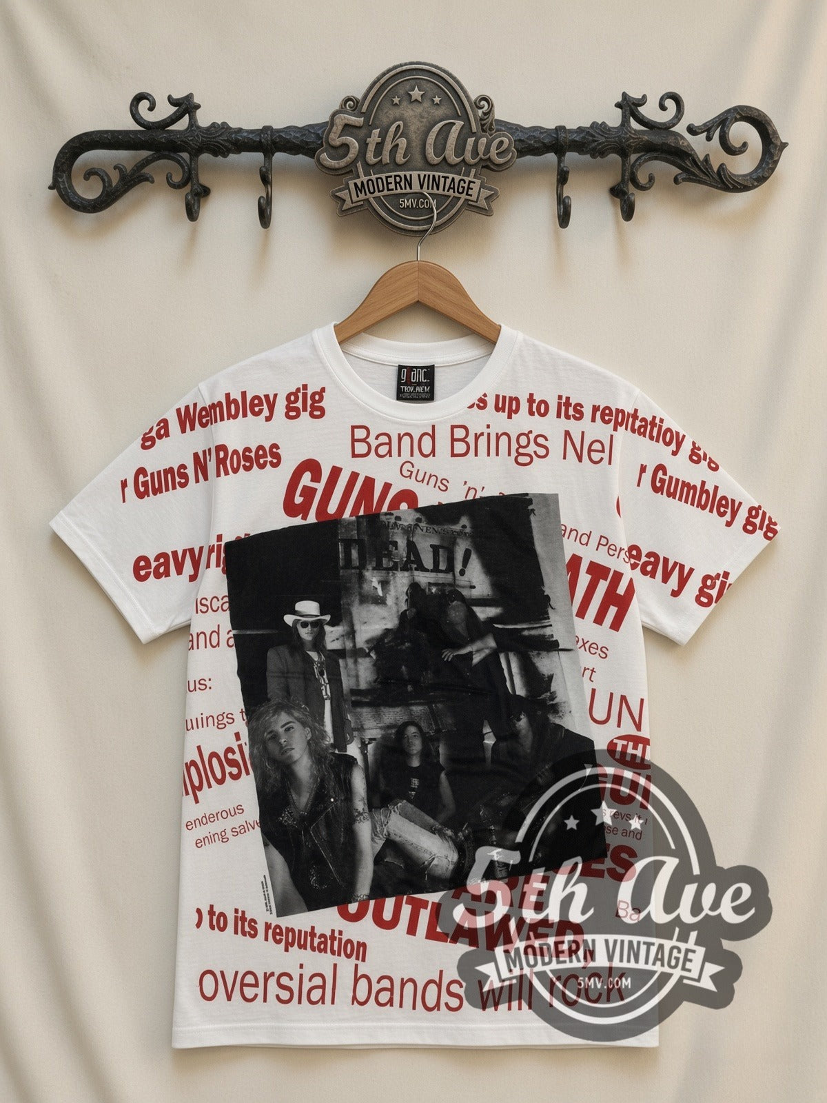 Guns N' Roses Newspaper Outlawed V2 all-over-print vintage band t-shirt, front view on a display rack