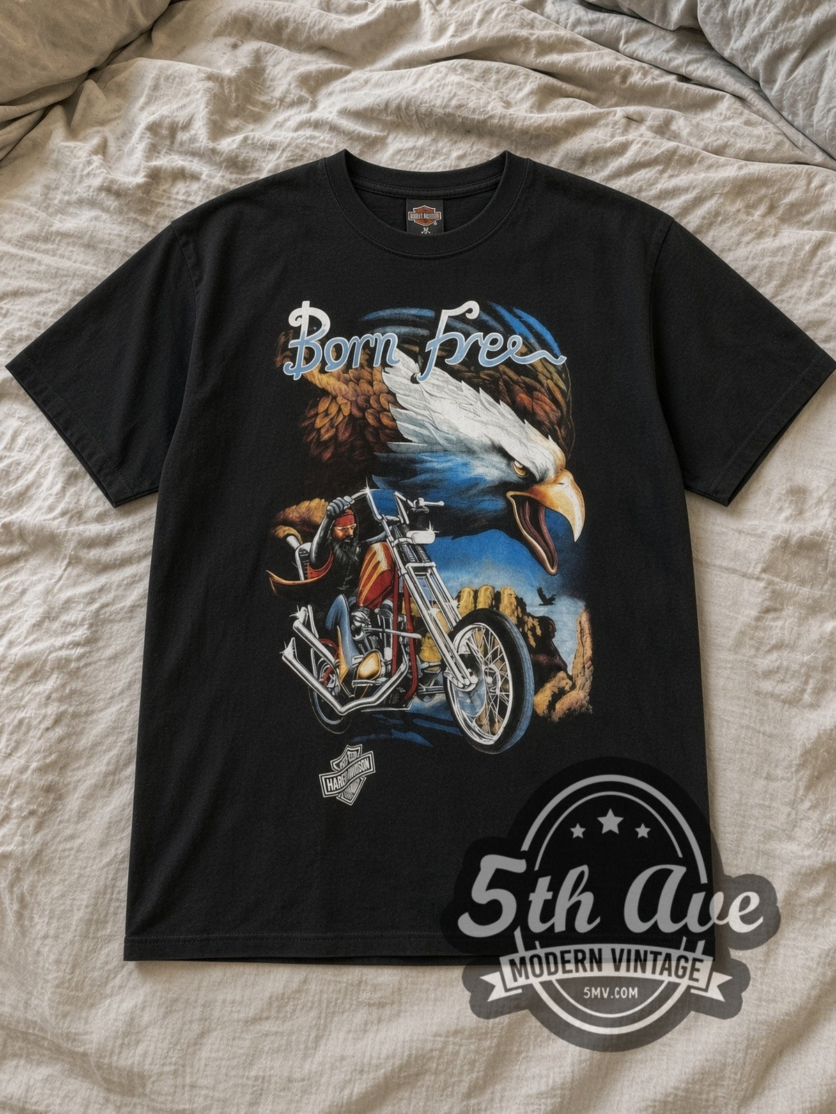 Black Harley Davidson Vintage Harley-Davidson T-Shirt laid flat on a linen bed