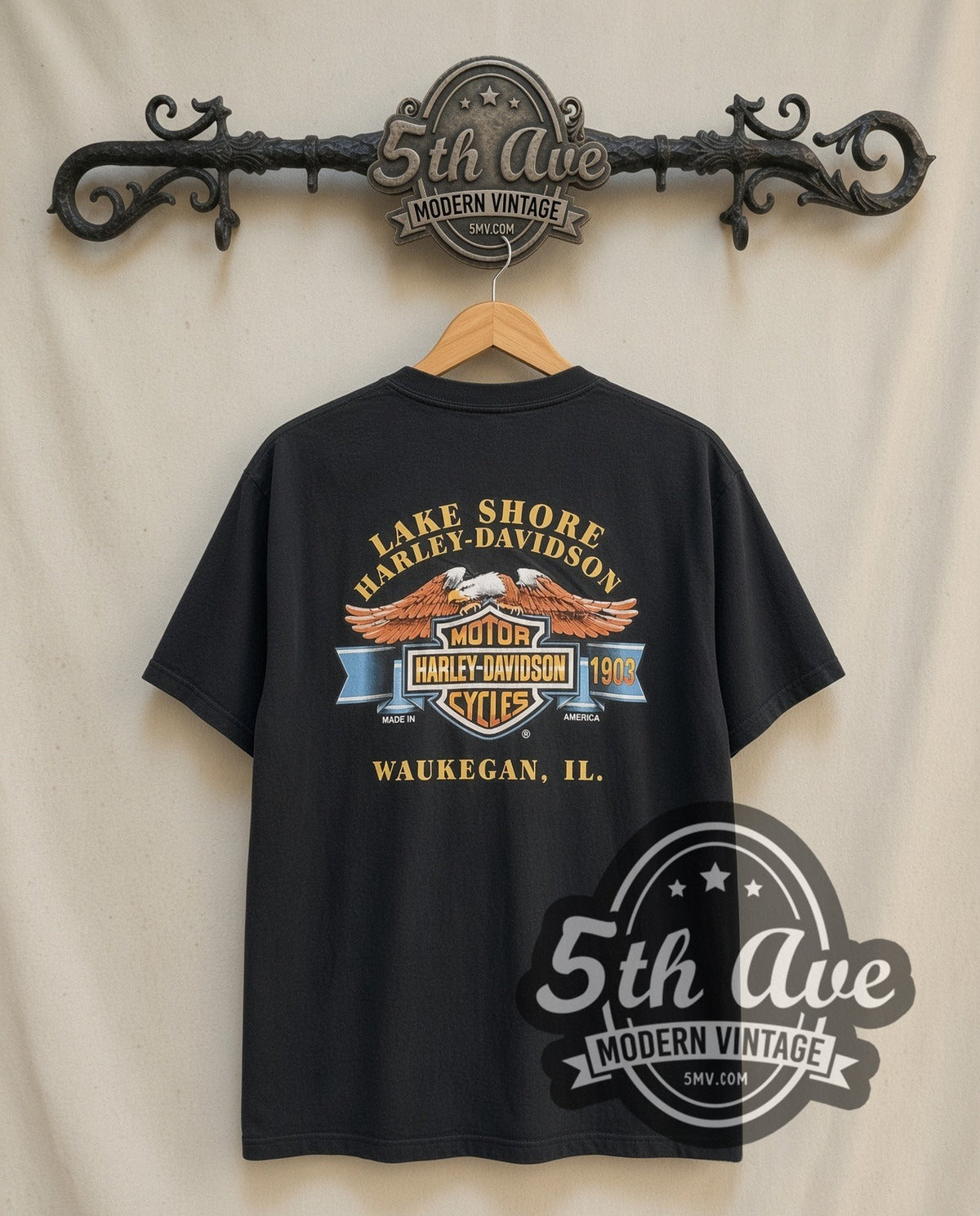 Harley-Davidson Bad to the Bone graphic tee in black, back view on a display rack