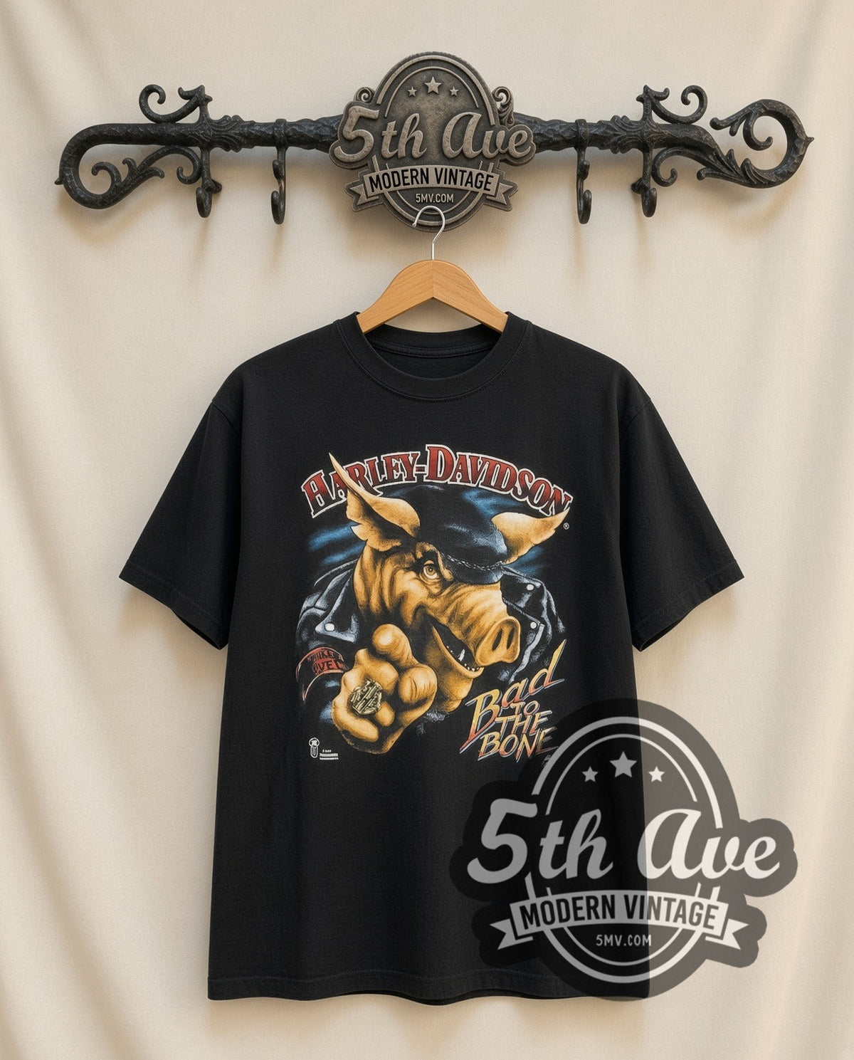 Harley-Davidson Bad to the Bone graphic tee in black, front view on a display rack