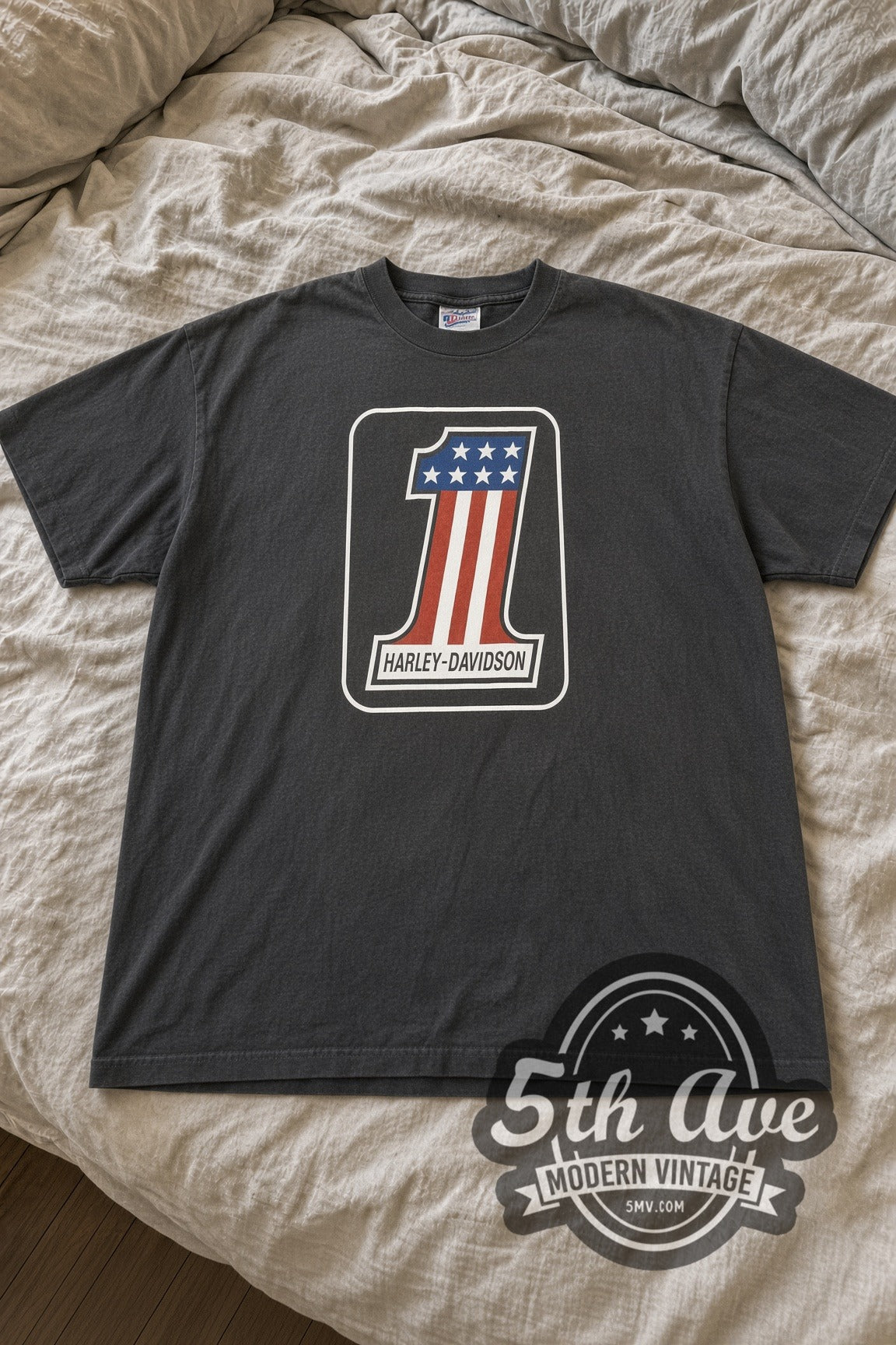 Harley-Davidson Eldridge #1 Shield vintage graphic tee laid flat on bed