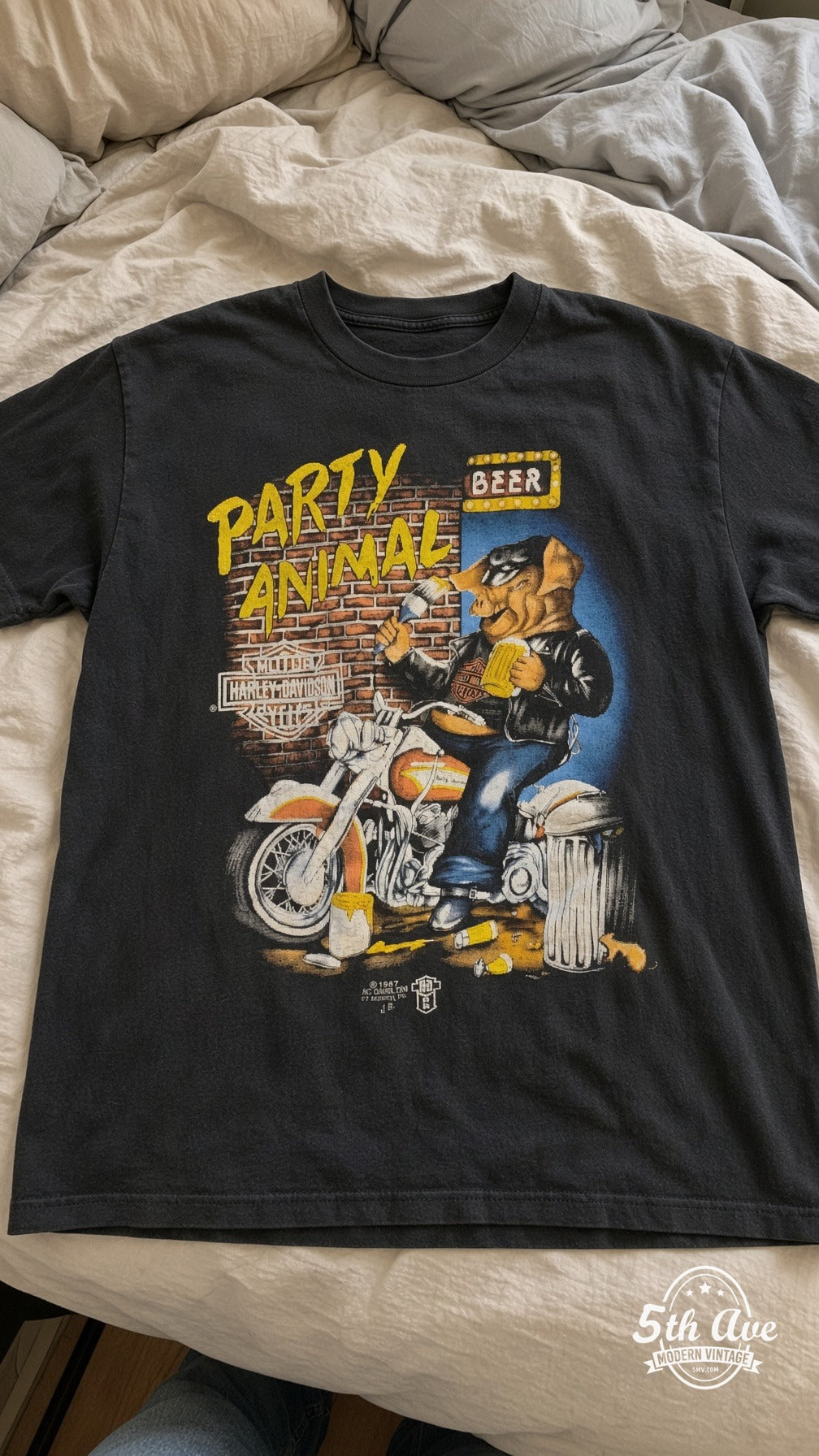 Harley-Davidson vintage t-shirt laid on bed