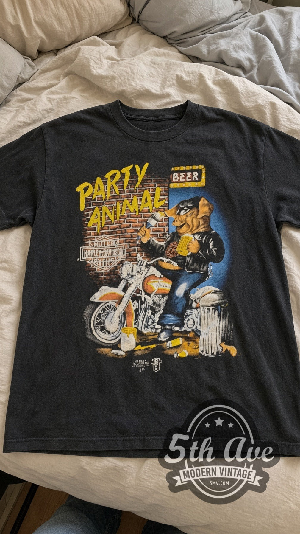 Harley-Davidson Far West Cycle Party Animal vintage graphic tee laid flat