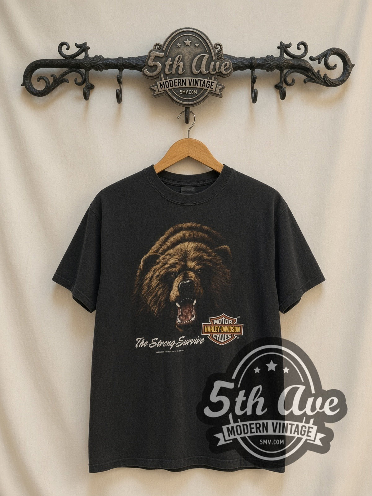 Harley-Davidson Joe's Place / The Strong Survive vintage Harley t-shirt, front view on a display rack