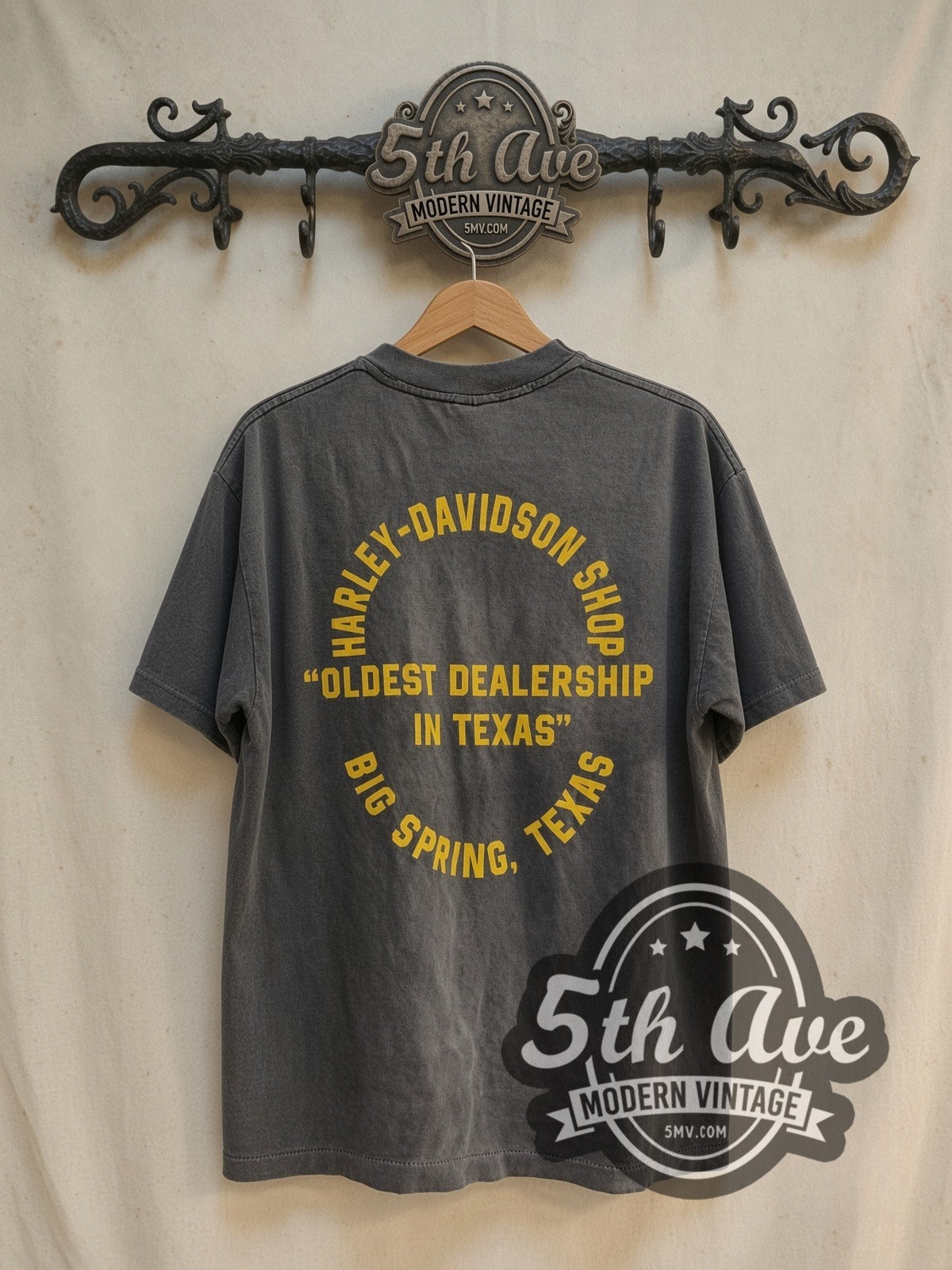 Harley-Davidson Rice Burner / Big Spring TX vintage graphic t-shirt, back view on a display rack