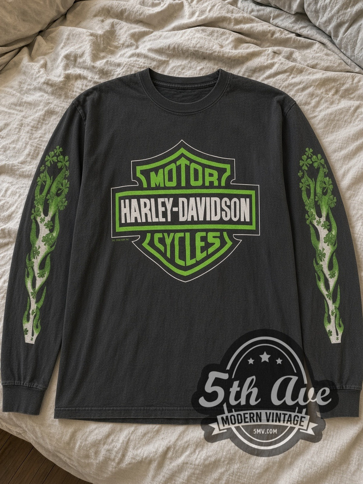 Black Harley-Davidson shamrock long sleeve laid flat on linen bed